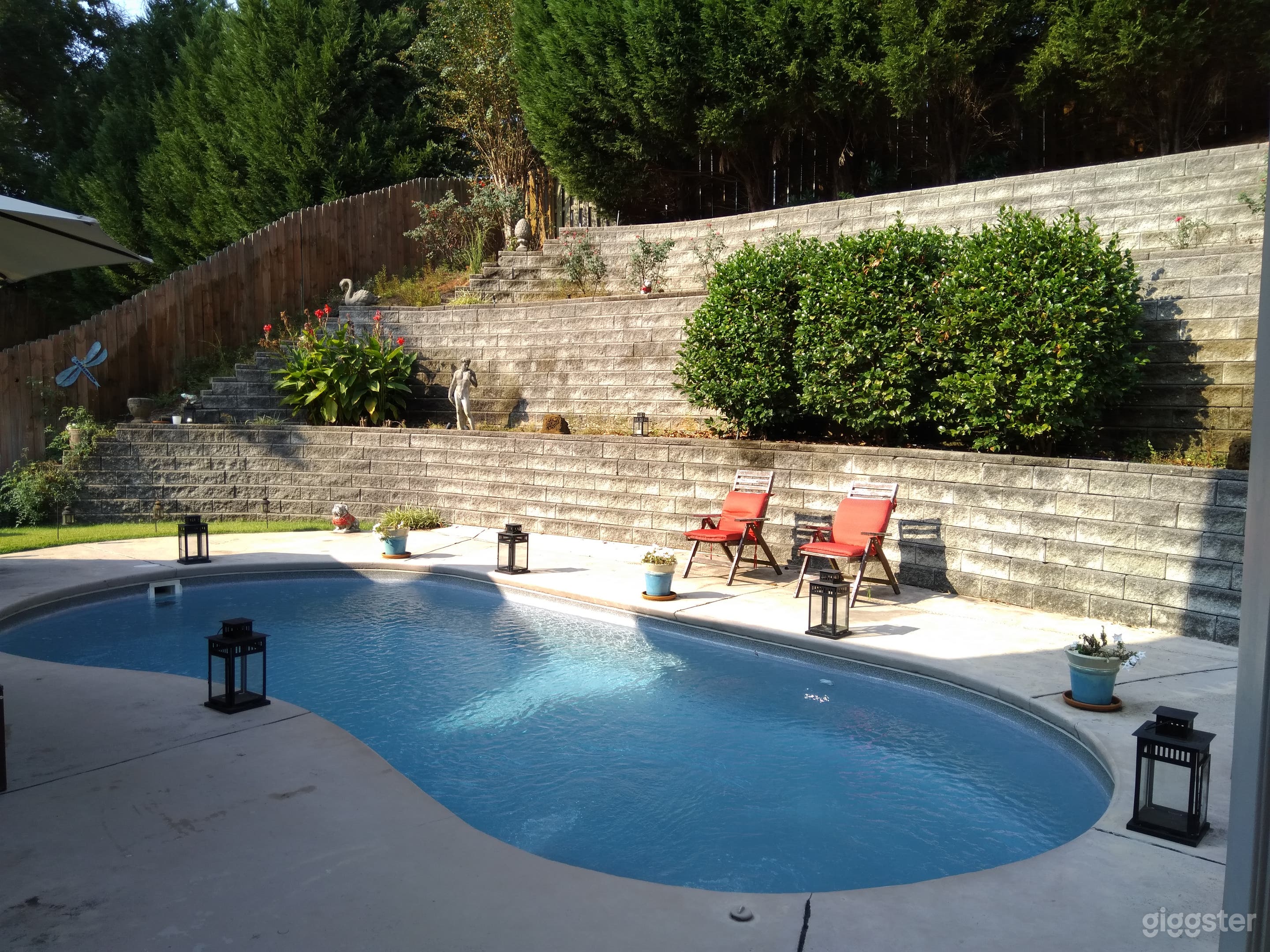 Private terraced backyard with pool