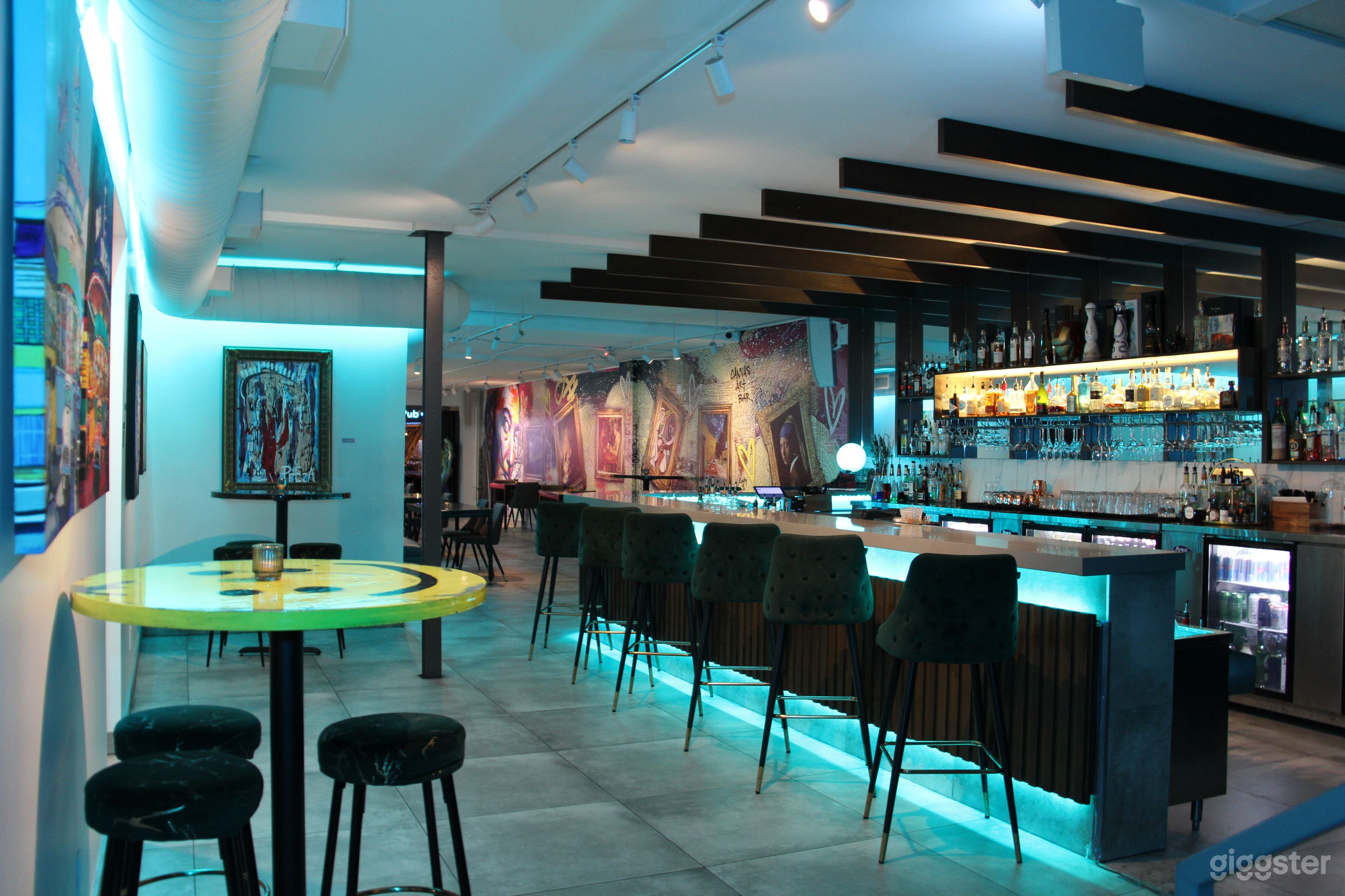 Gorgeous Art Inspired Bar with Rooftop Patio Photo 2