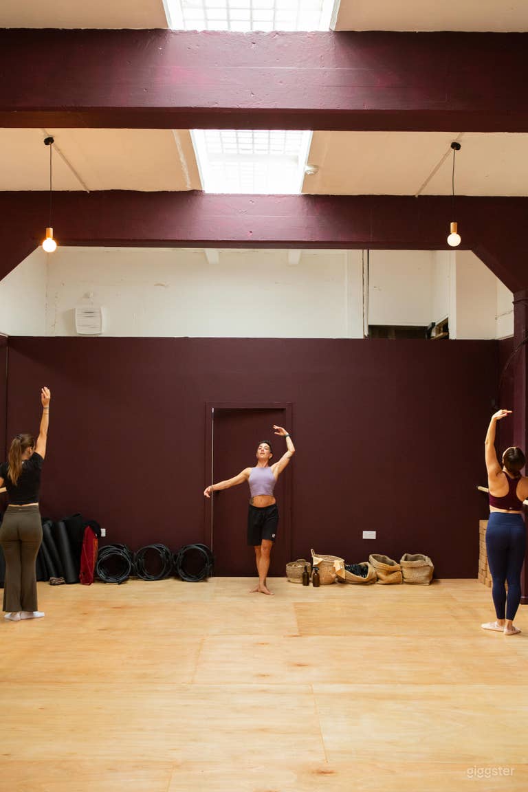  Versatile Dance Studio with Mirrored Wall and Barre Rail 