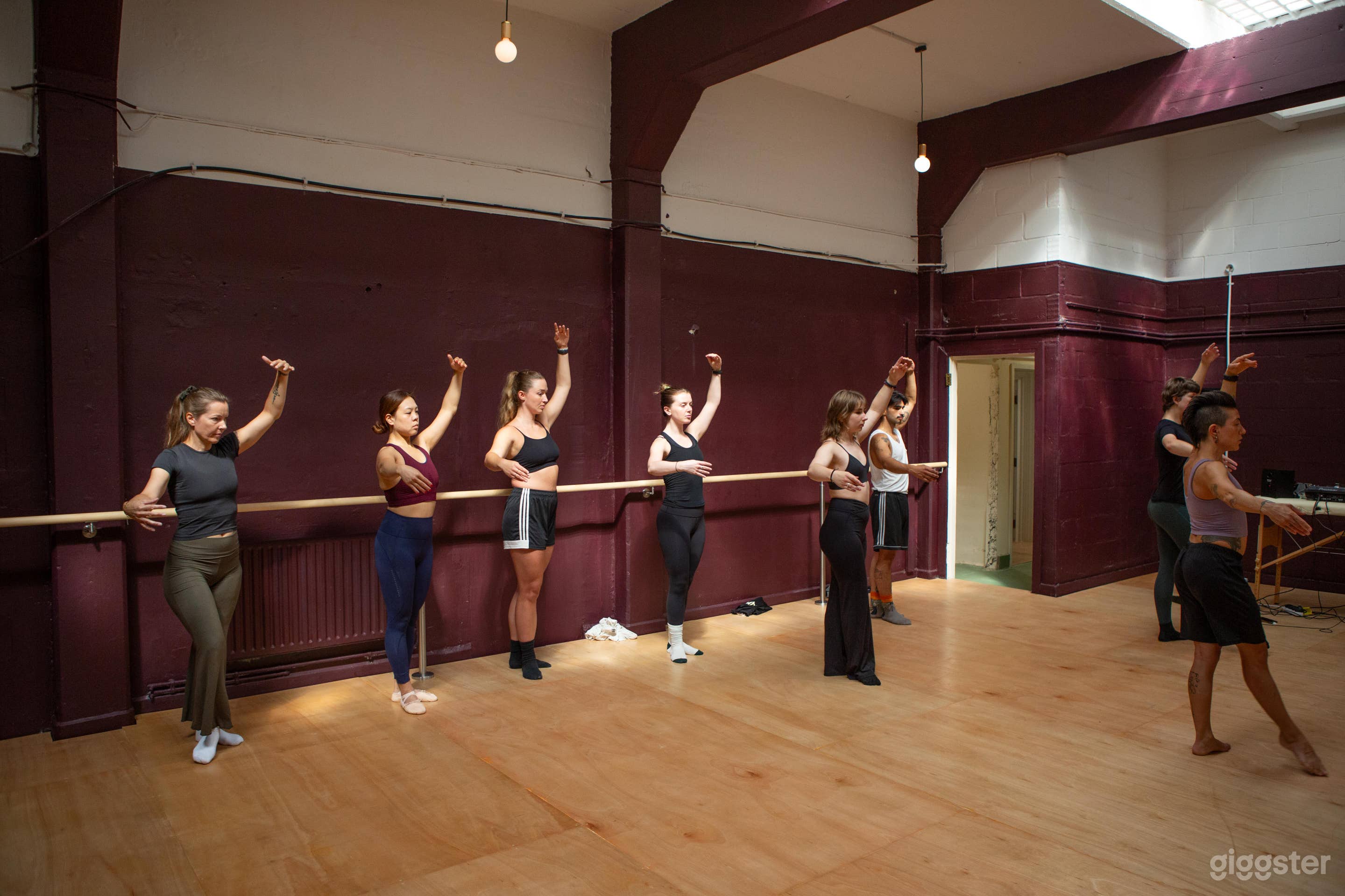 Versatile Dance Studio with Mirrored Wall and Barre Rail Photo 3