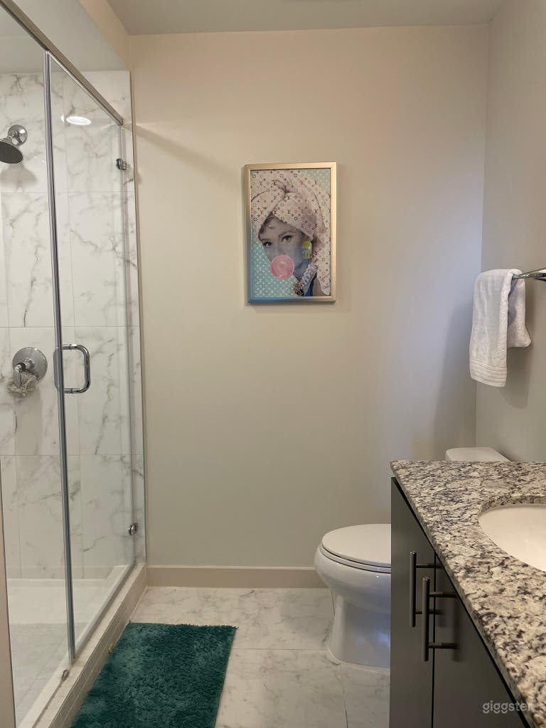  1/2 bathrooms, stand in shower with marble backsplash   