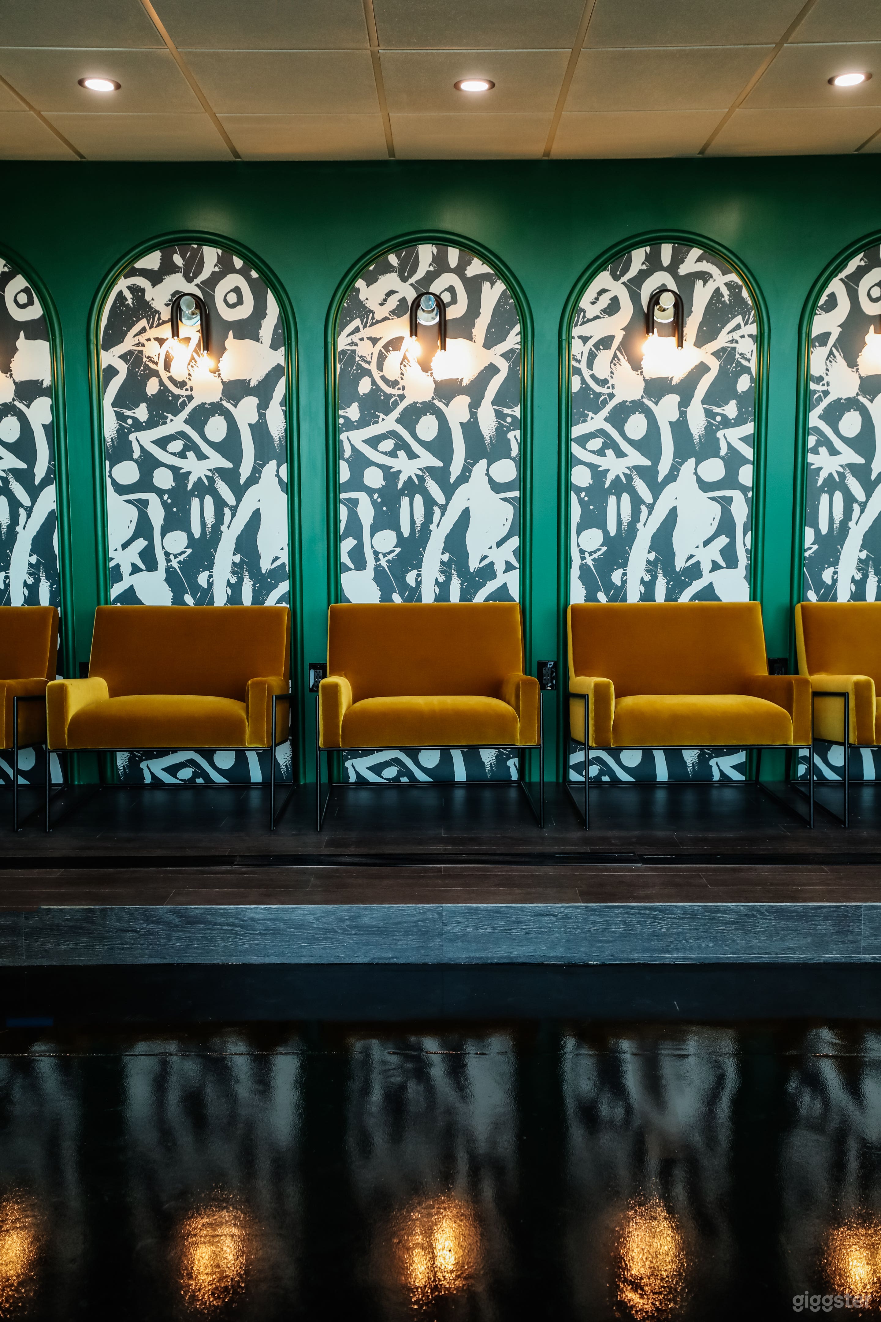 Yellow velvet chairs and custom archway work make great headshot or photo areas. Great light. 