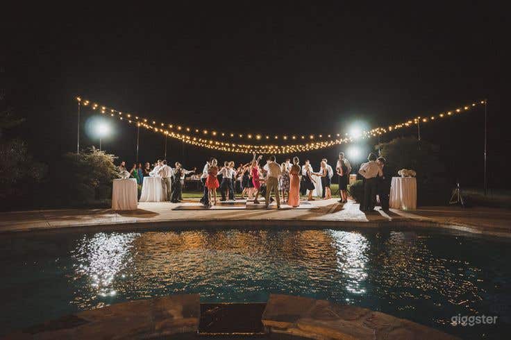 11-Gallon Oval Pool Surrounded by Lush Grenery Photo 3