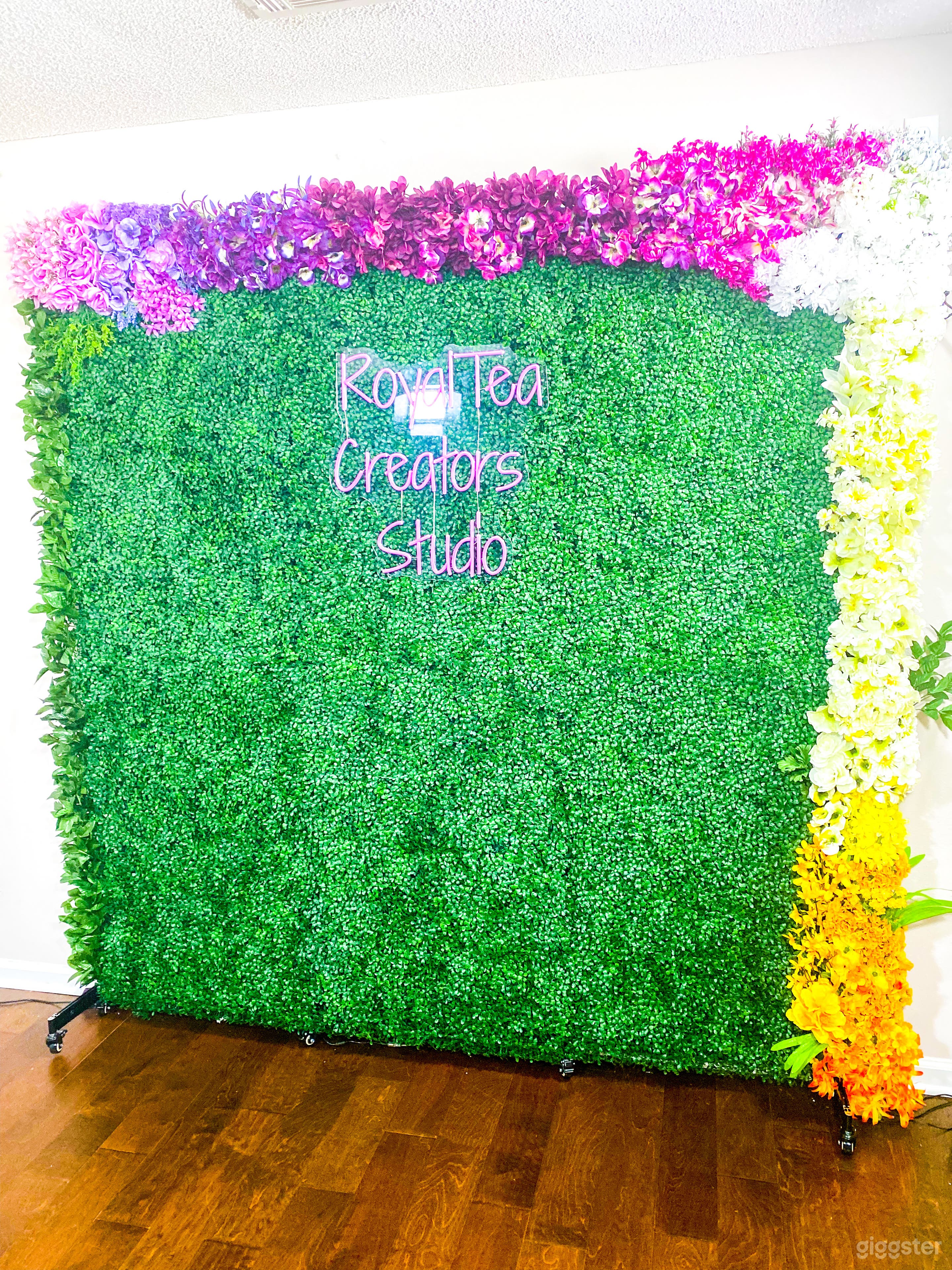 Floral grass wall. Photography area with backdrops. Bring your own camera and props.