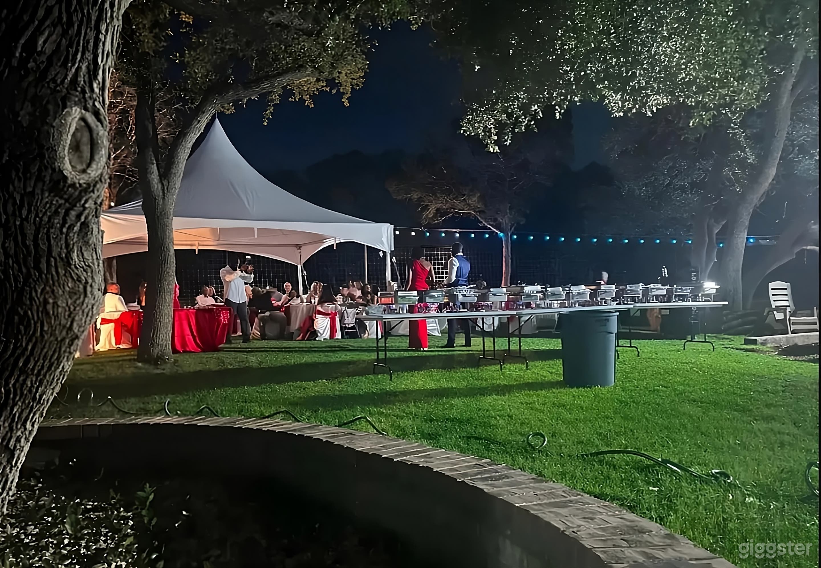 Spacious Oak-Shaded Backyard Photo 1