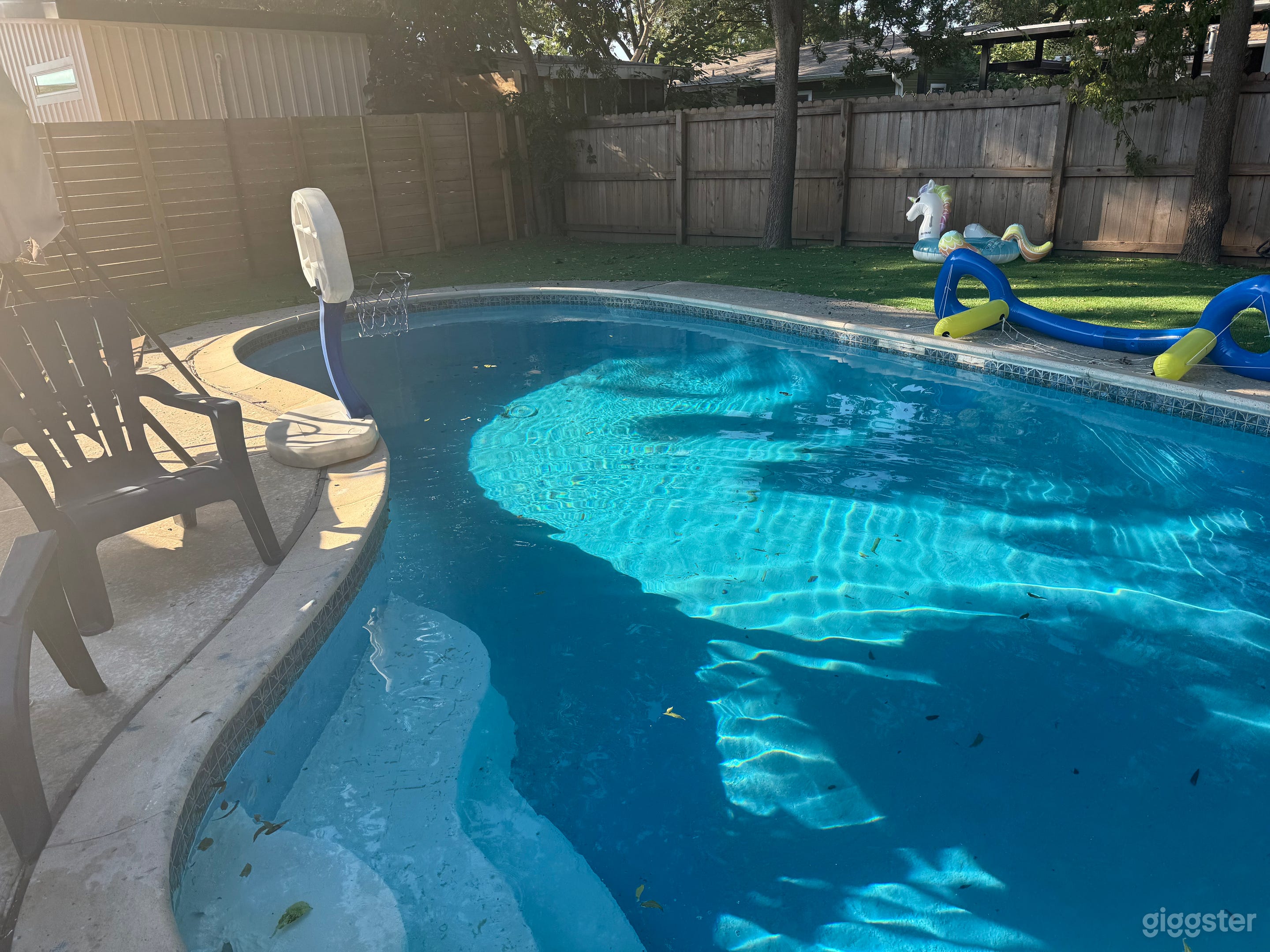 Stylish and Cozy Backyard Pool Photo 1