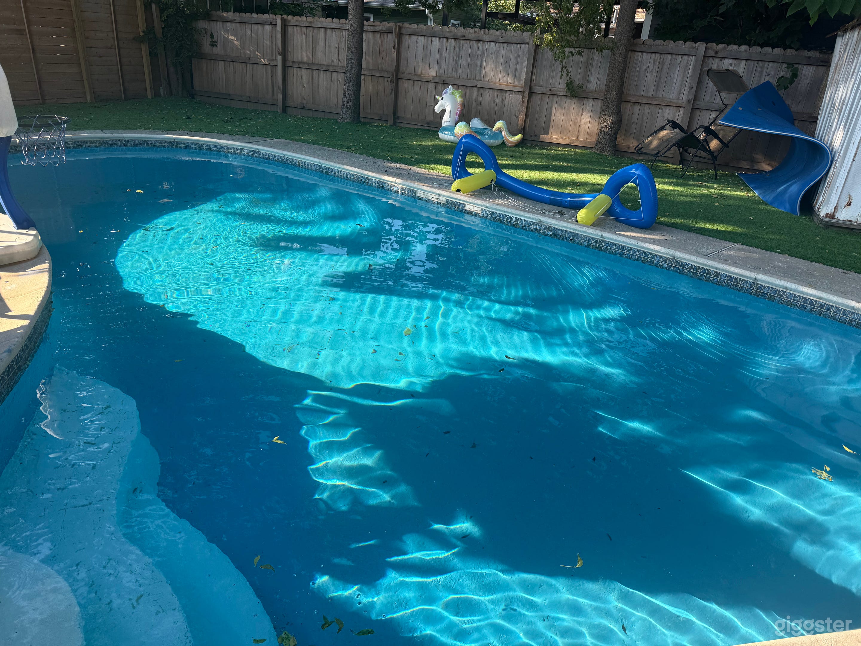 Stylish and Cozy Backyard Pool Photo 3