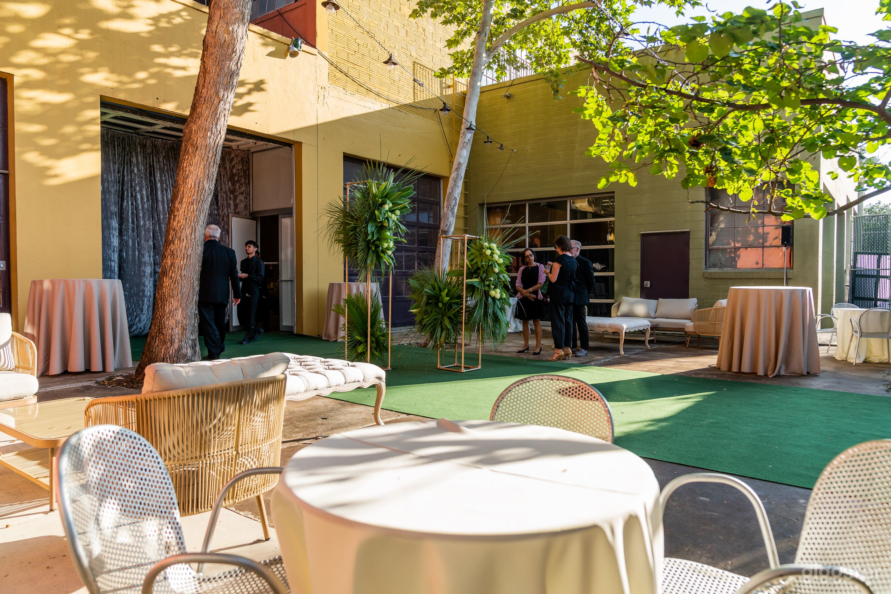 Daytime event in the courtyard at Artpace. 