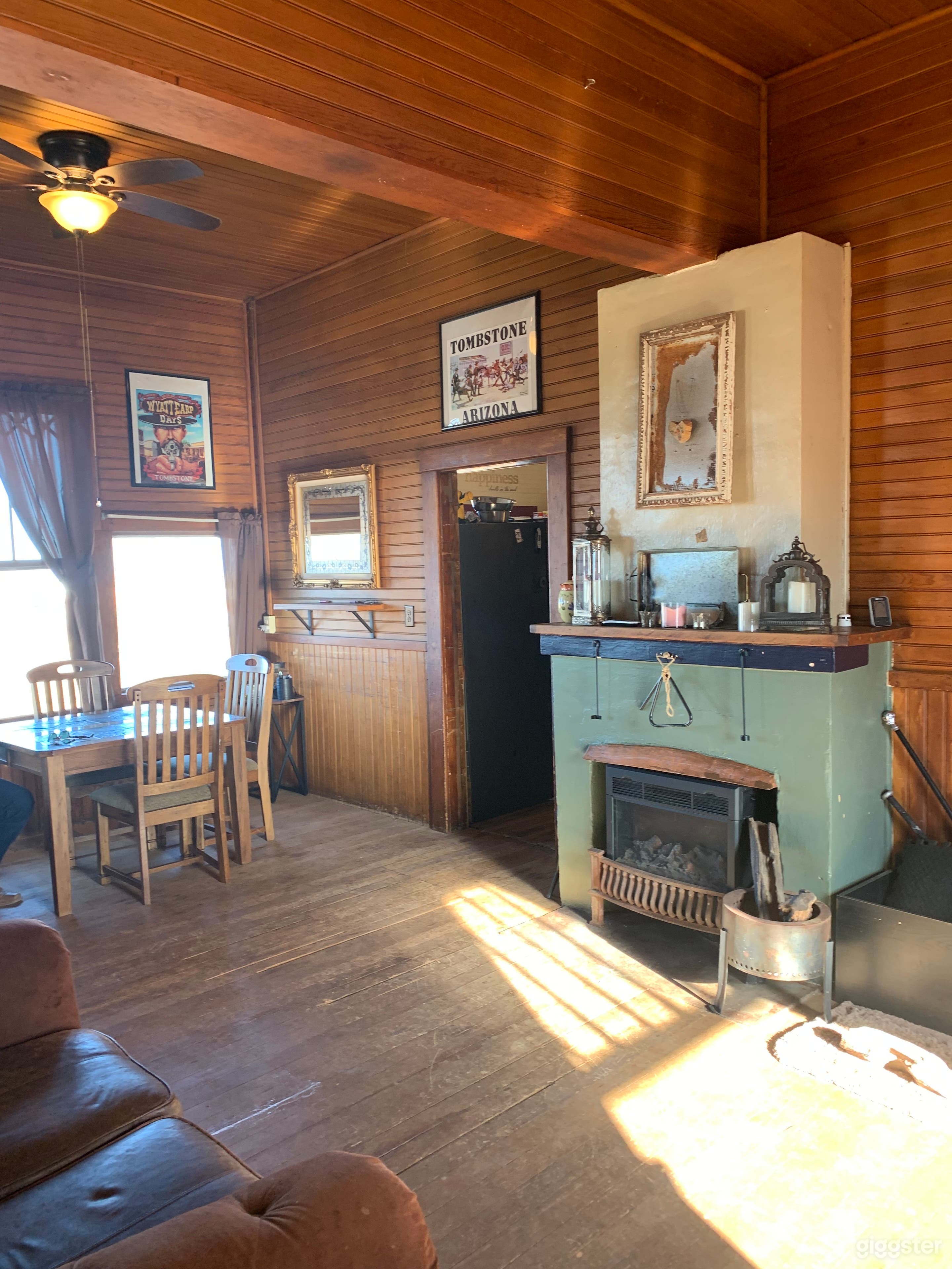 Living room with original hardwood walls, floor and ceiling 