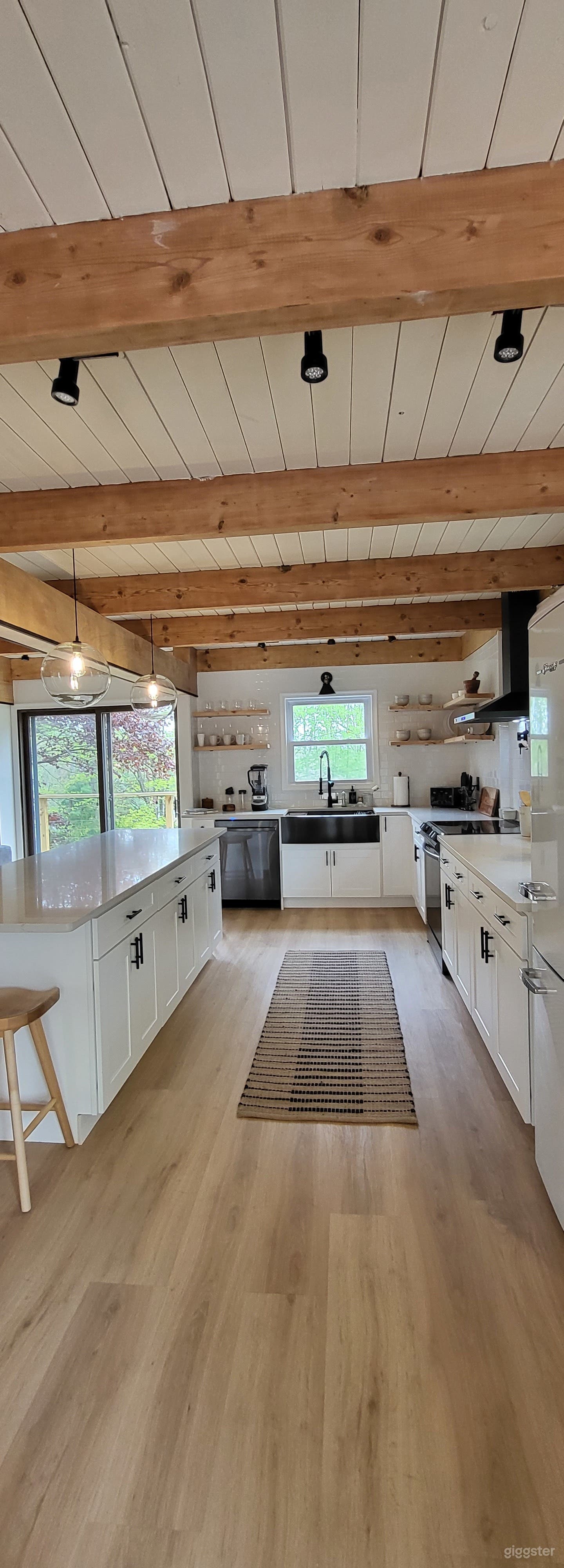 Bohemian Black Cabin with Floor to Ceiling Windows Photo 3