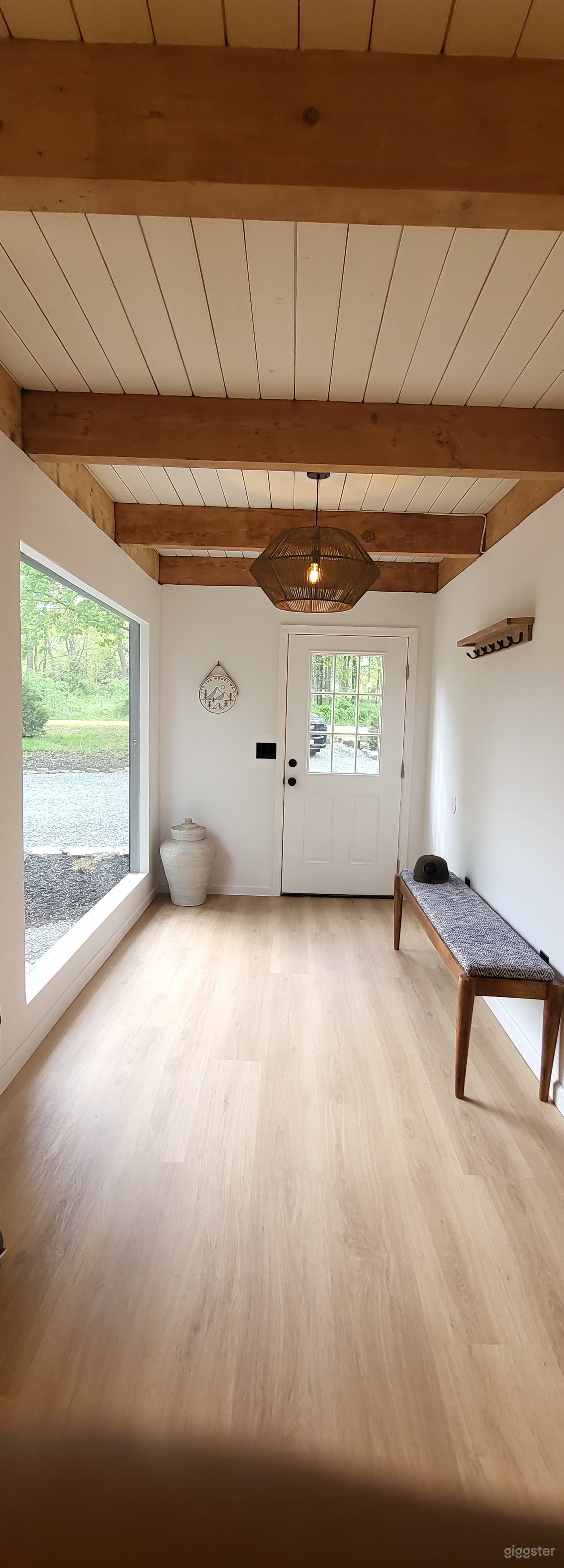 Bohemian Black Cabin with Floor to Ceiling Windows Photo 2