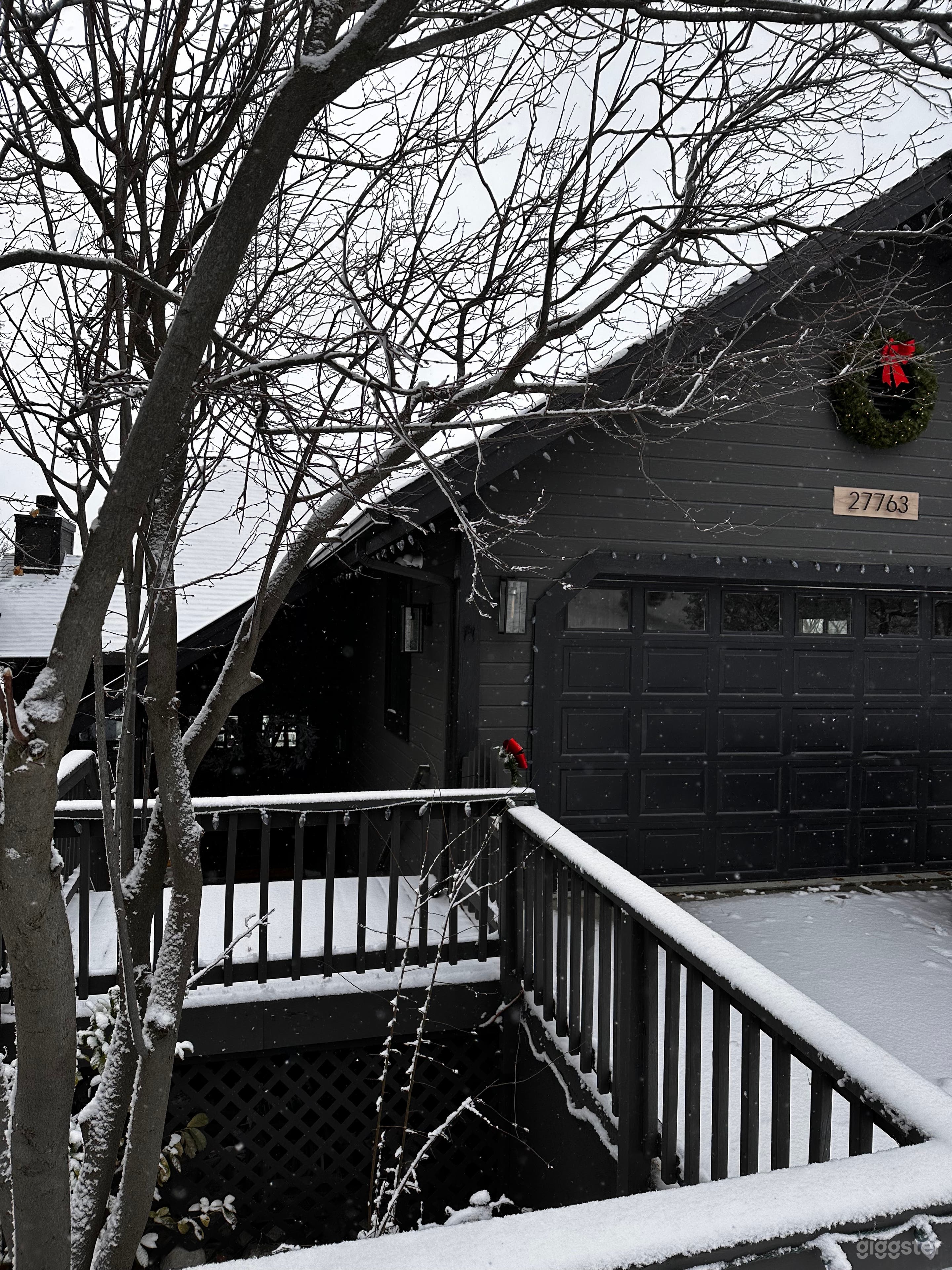 front of house during winter snow.