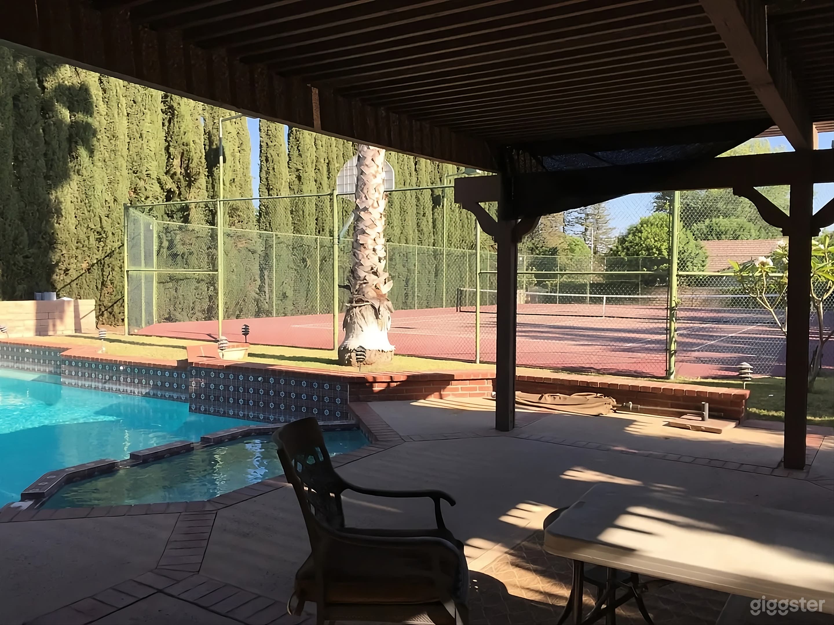Backyard Poolside & Tennis Court Retreat Photo 1