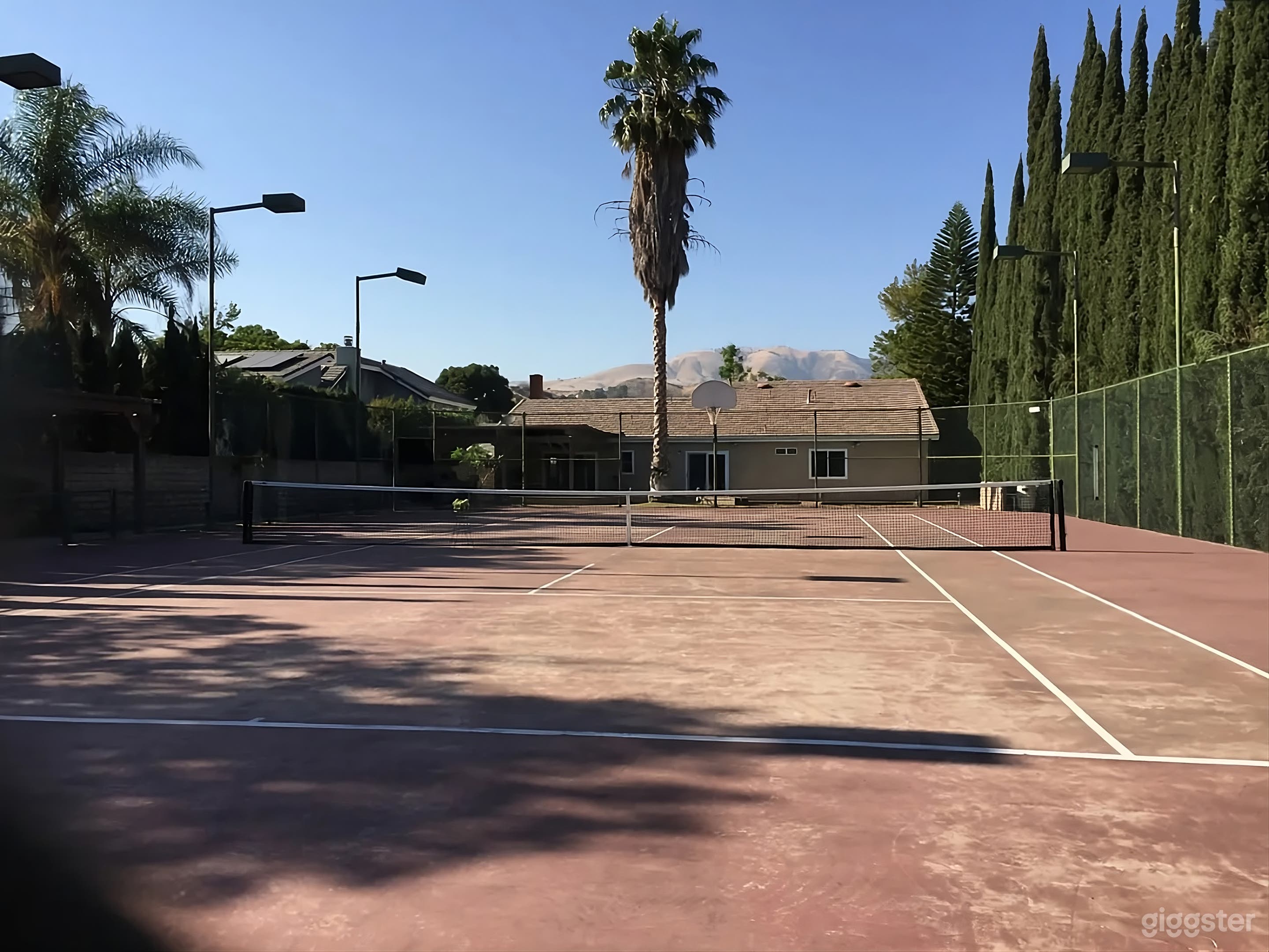 Backyard Poolside & Tennis Court Retreat Photo 4