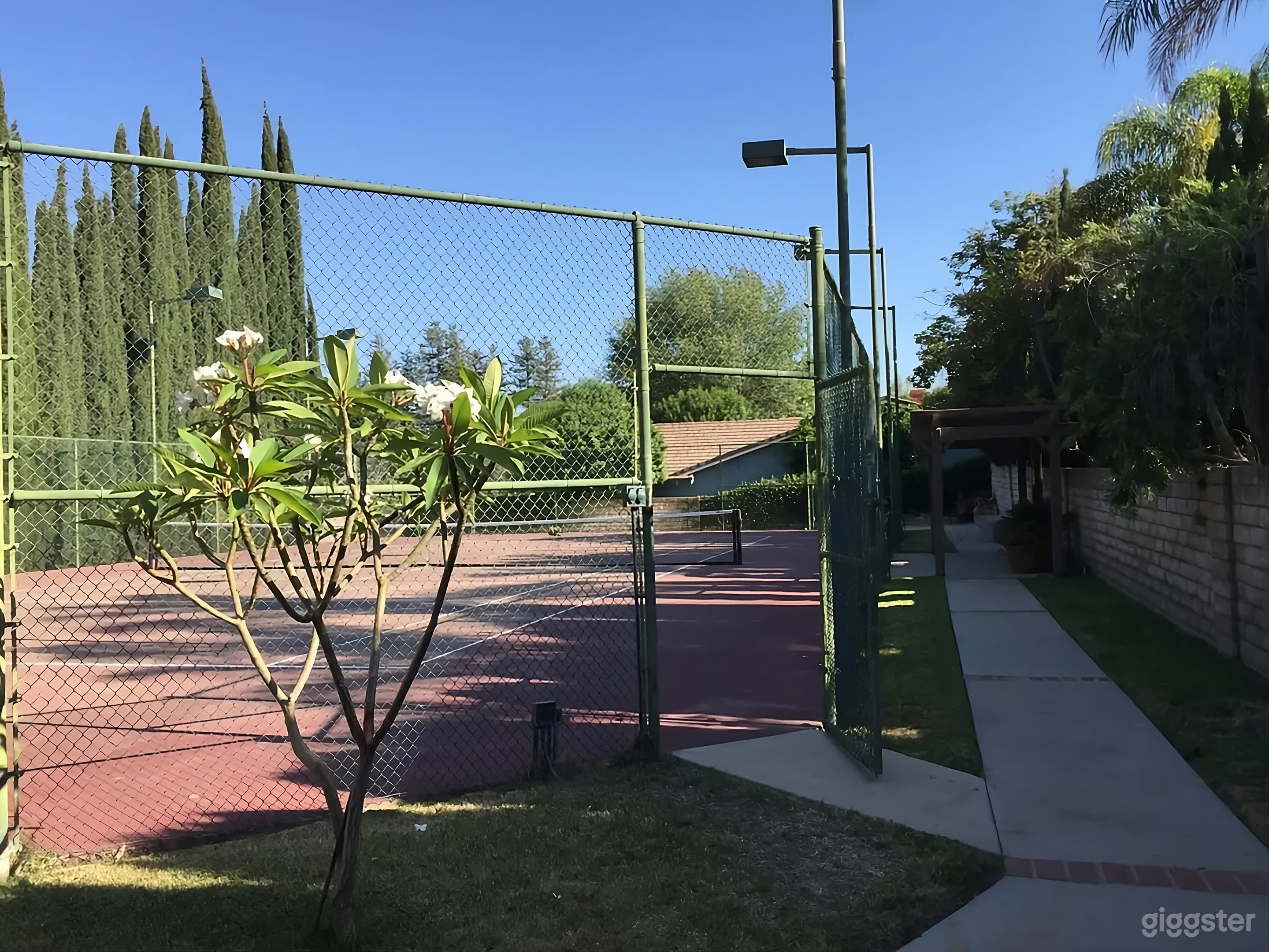 Backyard Poolside & Tennis Court Retreat Photo 2
