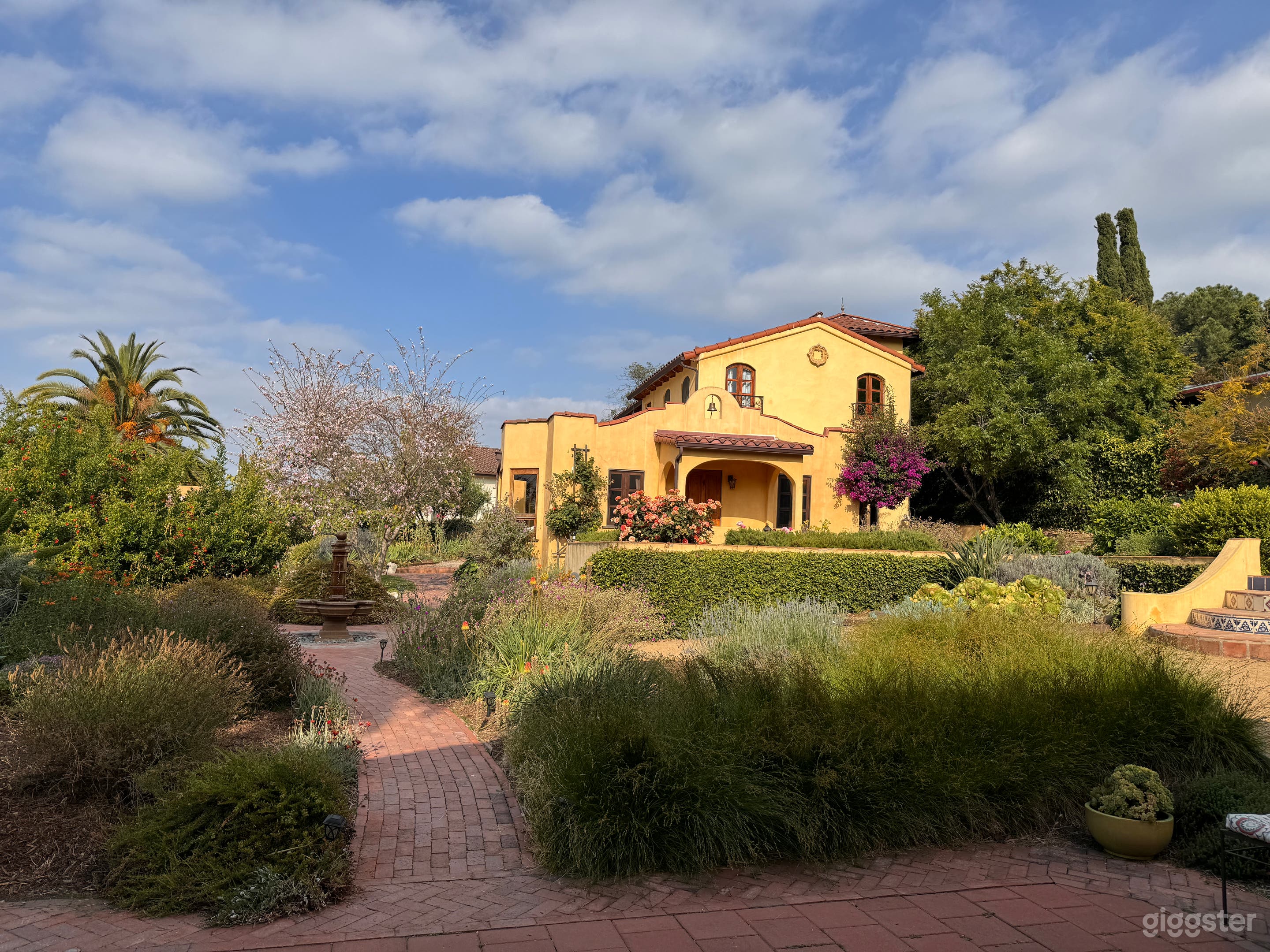 Charming Spanish-Style Backyard Photo 1