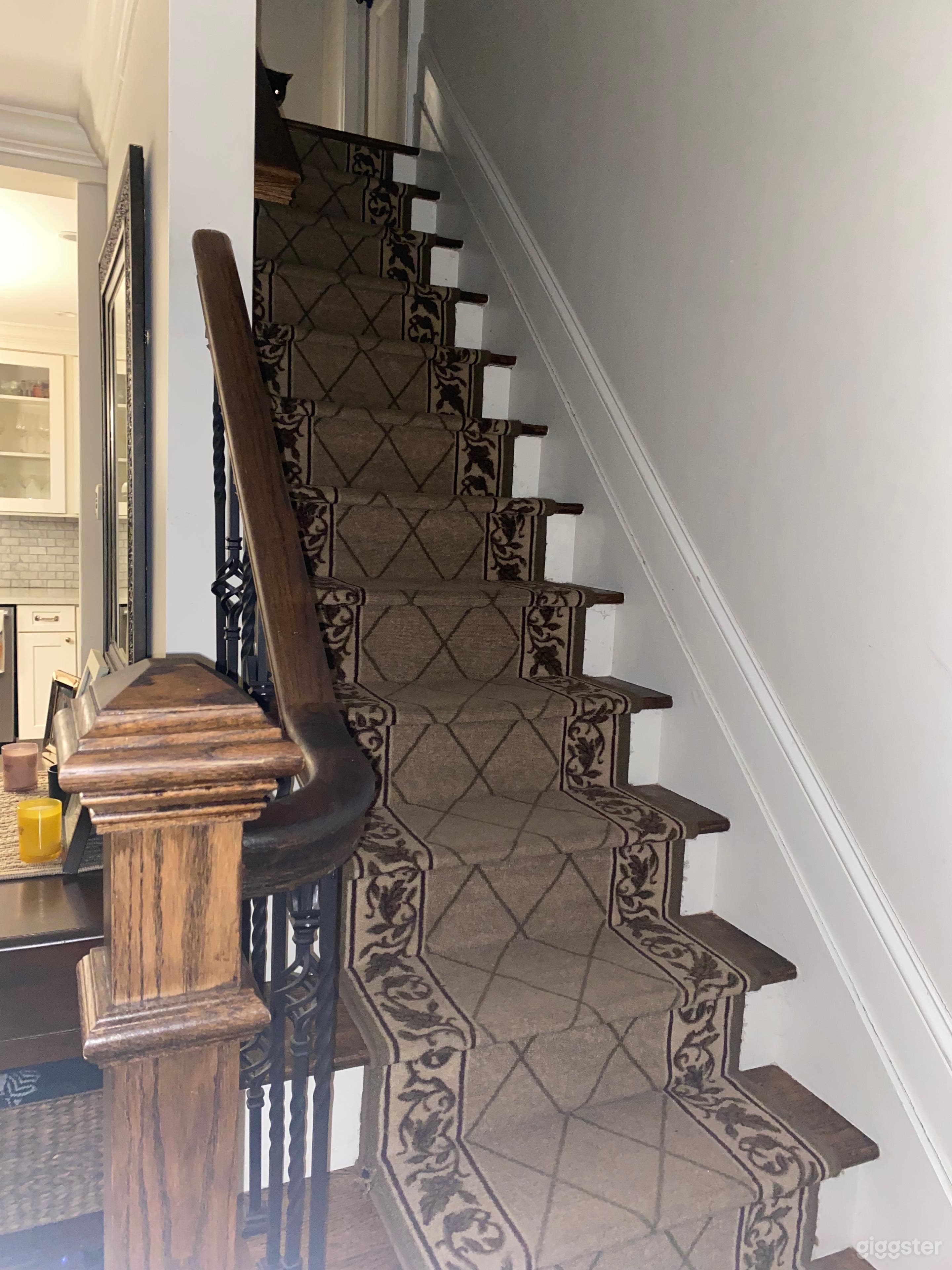 front stairwell- leads up to two bedrooms and a bathroom