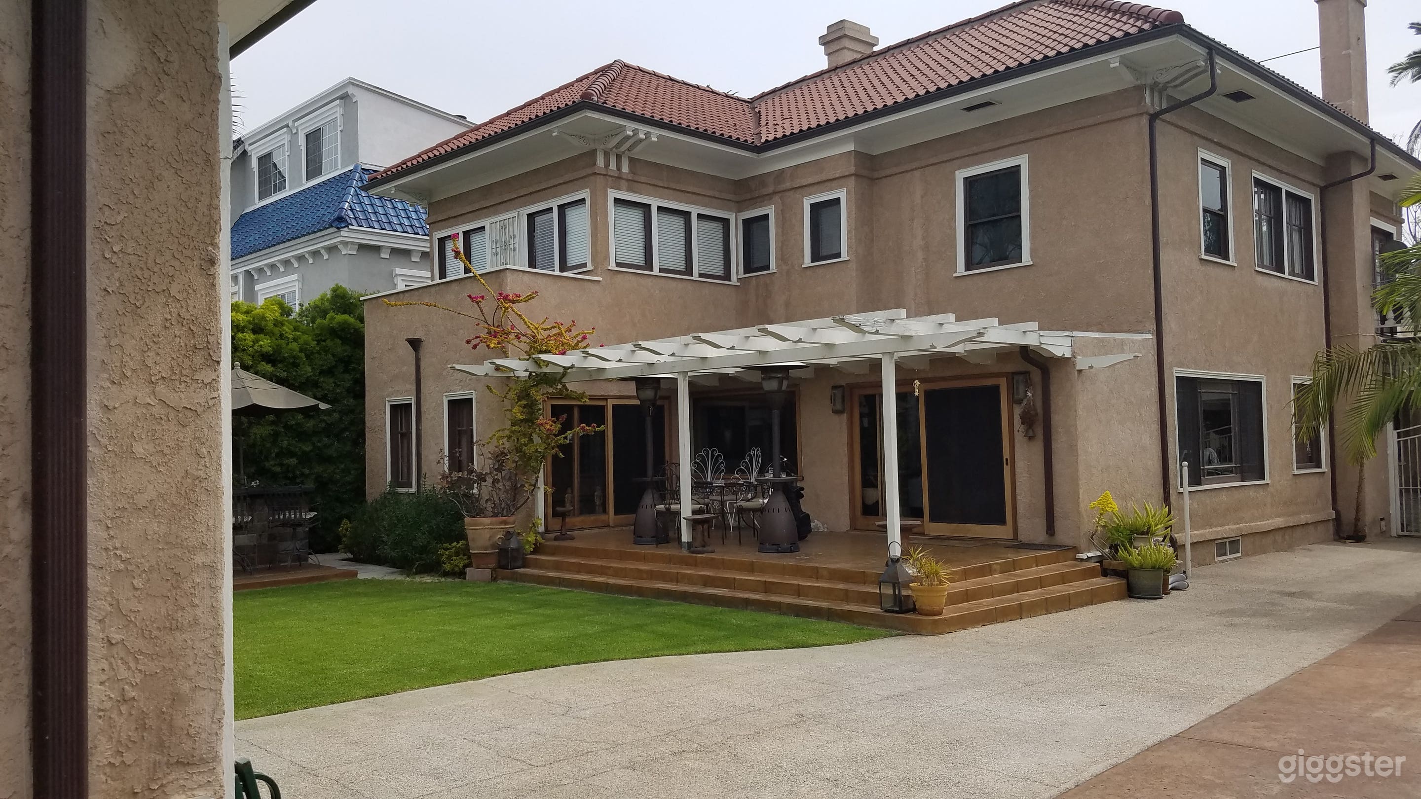 Rear of house showing porch and balcony