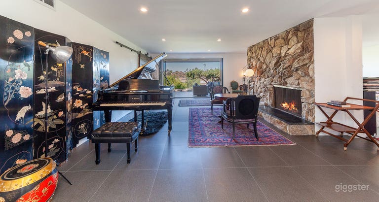  Living room features Kawai grand piano and fireplace. 