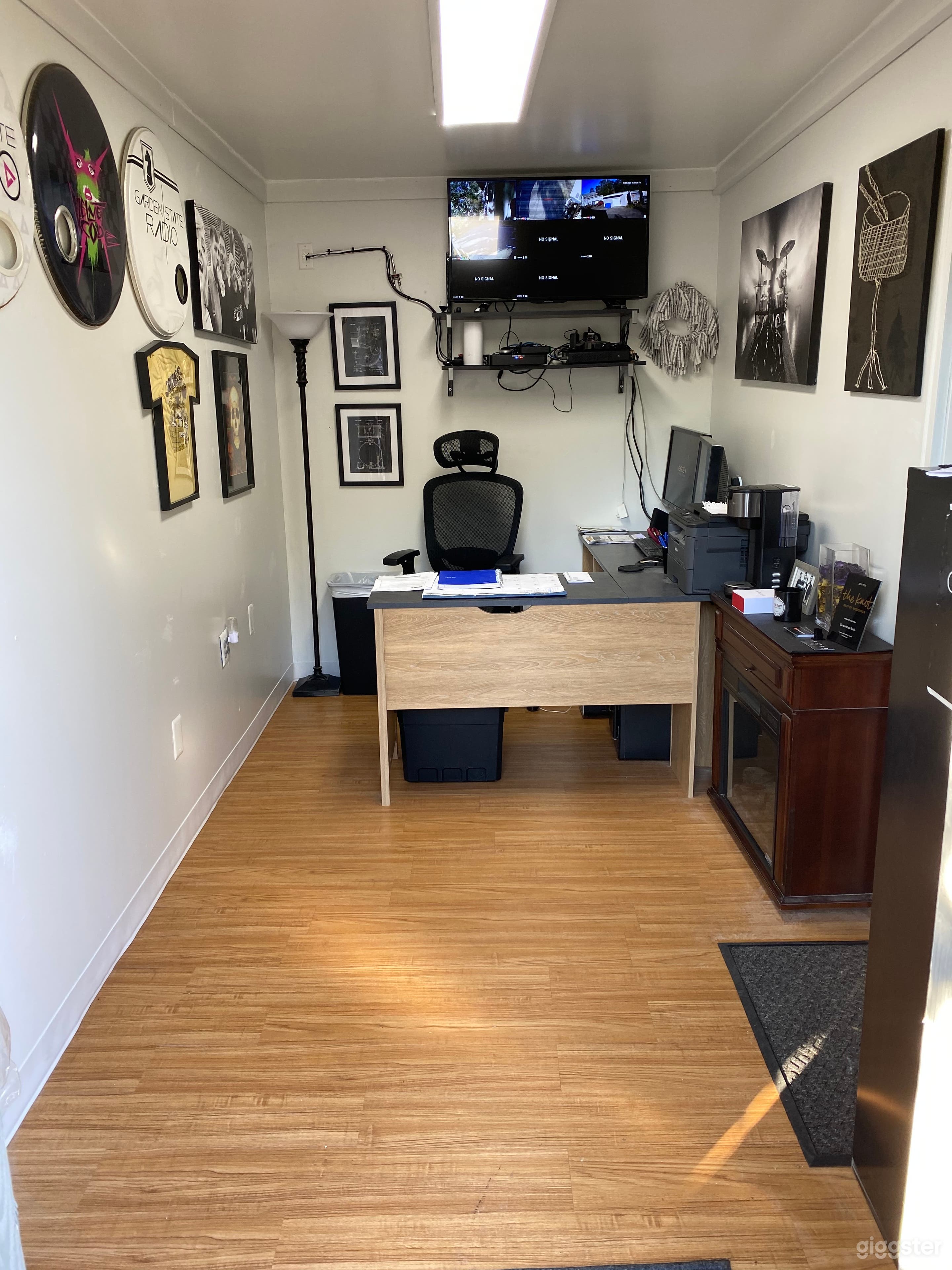 Office with a desktop computer for any on site needs.