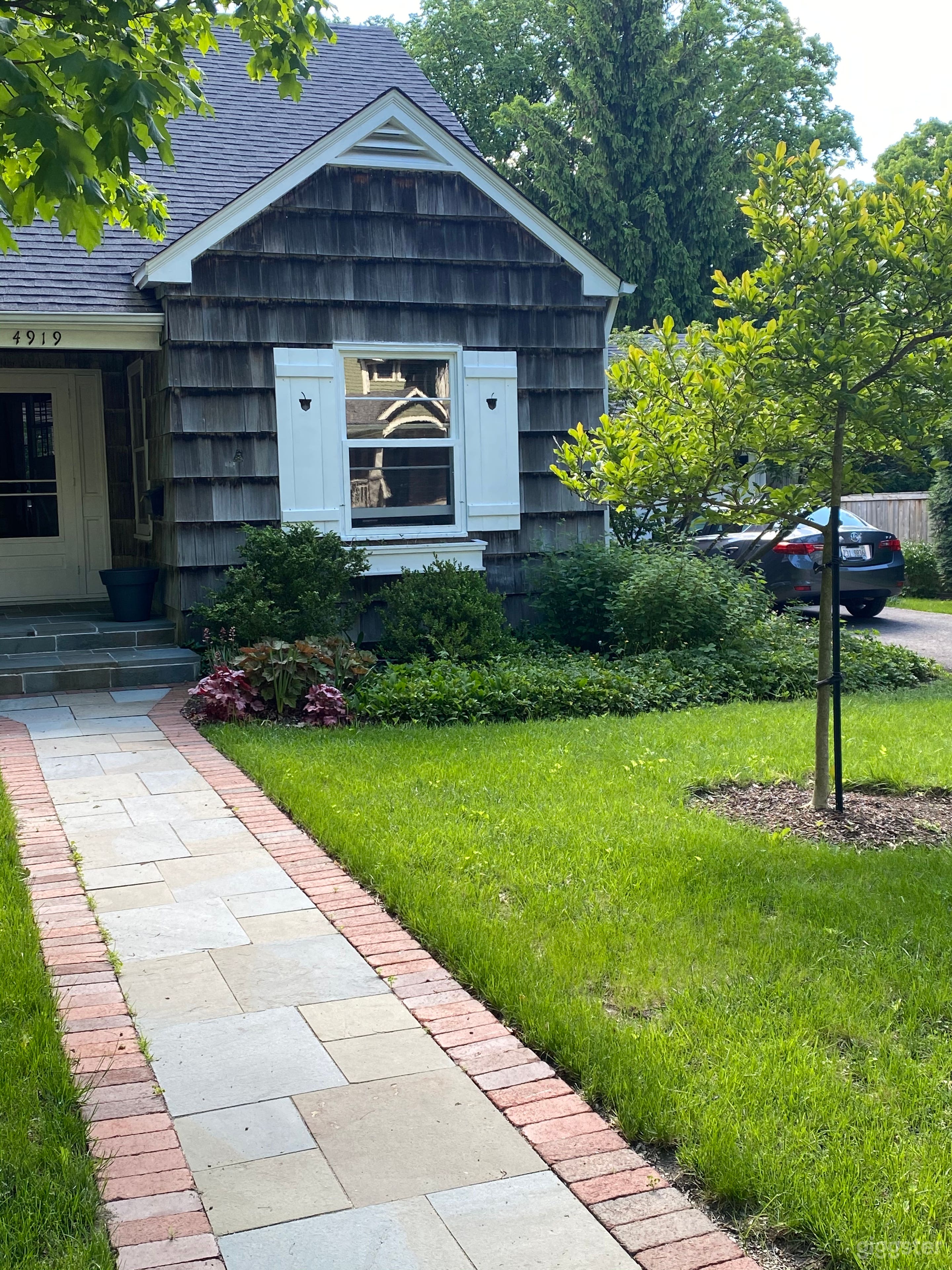 Cape Cod w/cedar shingle on a cobblestone str.  Photo 2