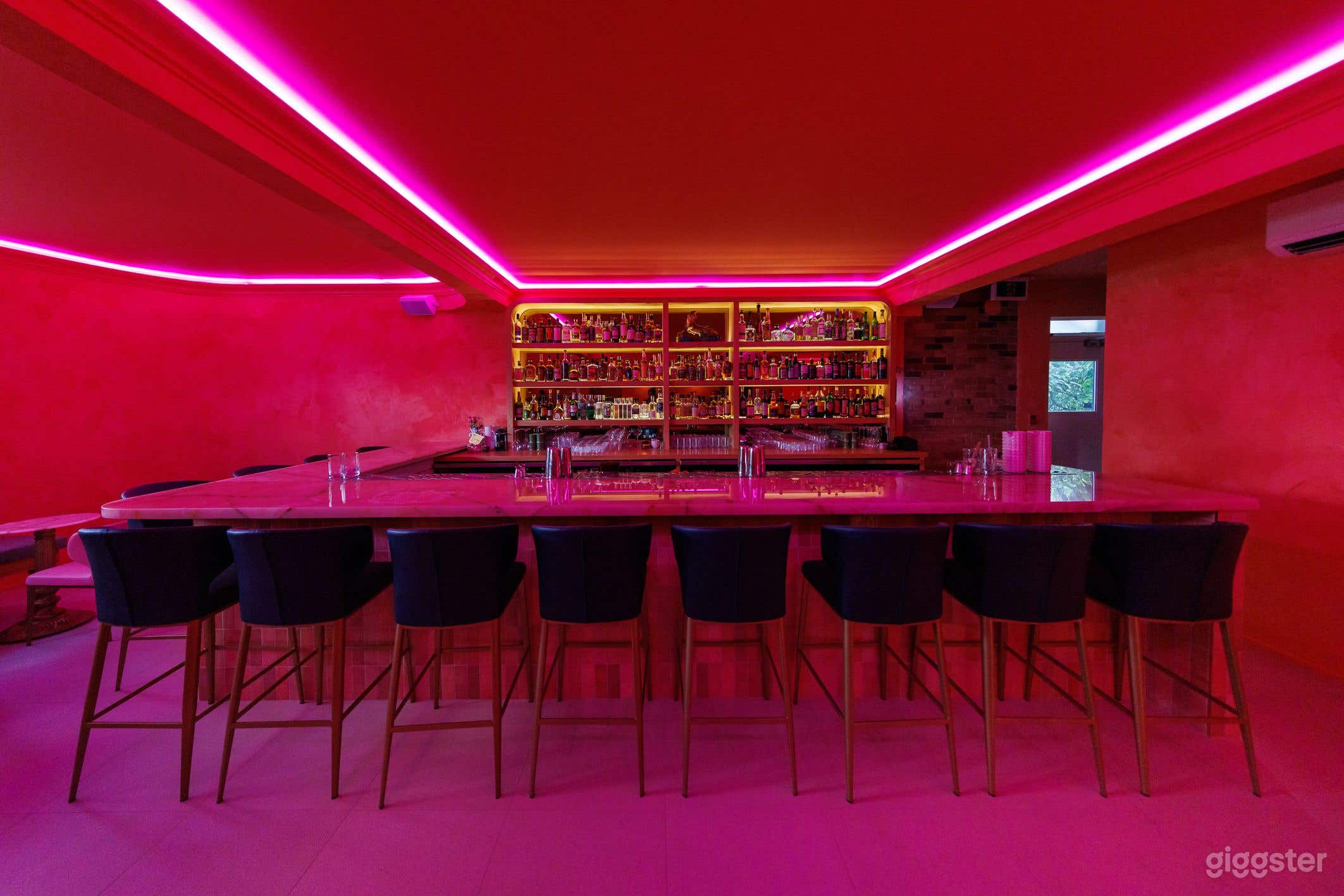 Chic and Vibey Pink Hued Cocktail Lounge Photo 3