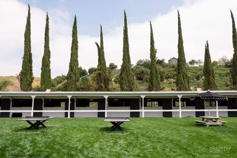  20,000 sq feet of lawn surrounded by remodeled old world barns. 