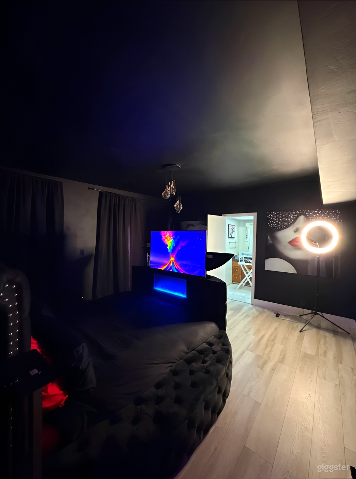 Moody Luxury Blackout Studio with LED Fireplace Photo 1