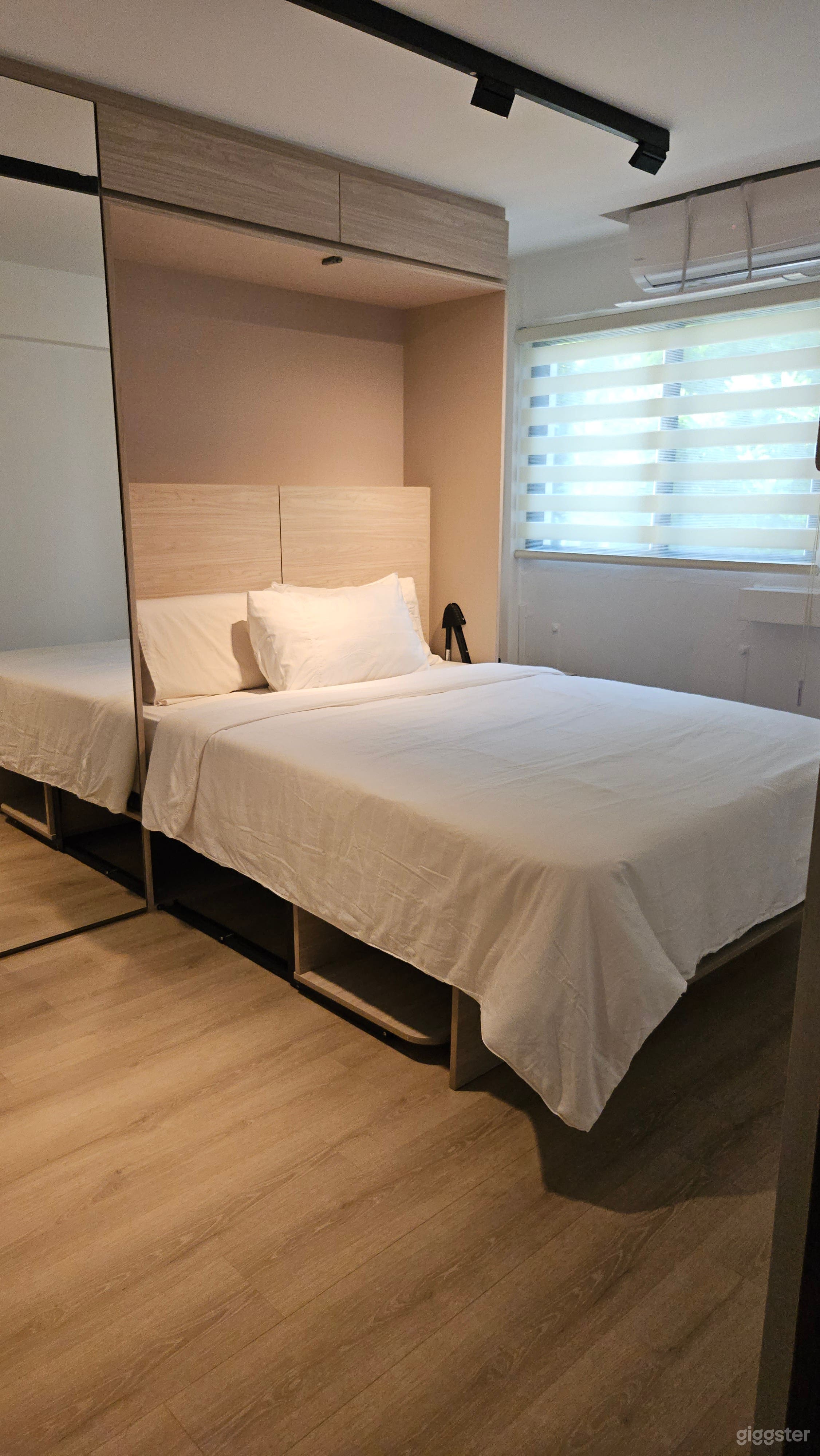 Minimalist Living with Hidden Luxuries & Wine-Inspired Charm Photo 3