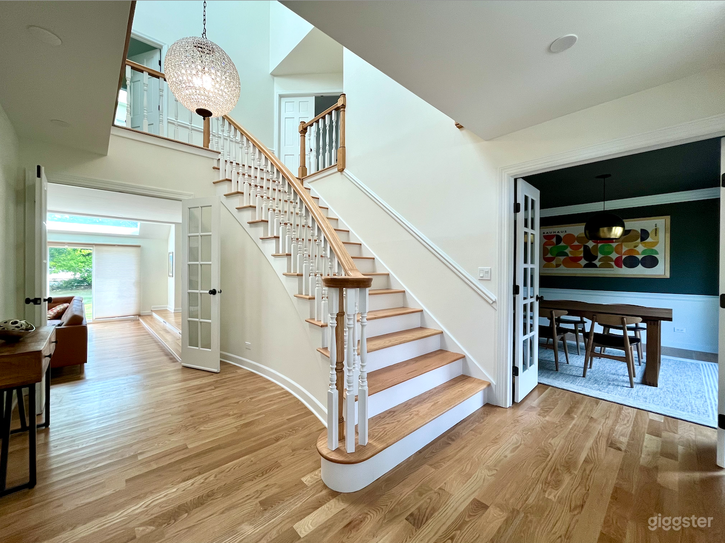 Updated Colonial-Inspired Home With Curved Staircase Photo 1