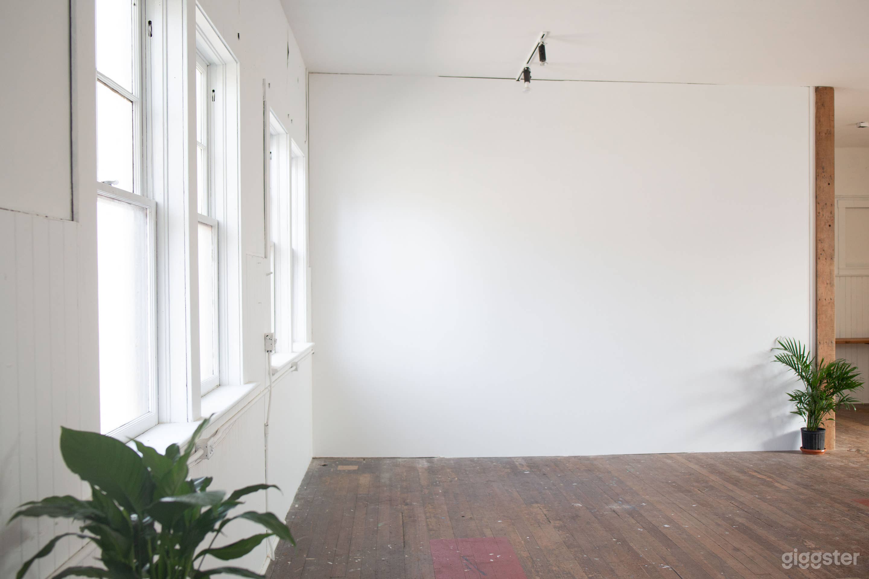 Minimalist Natural Light Studio Photo 1