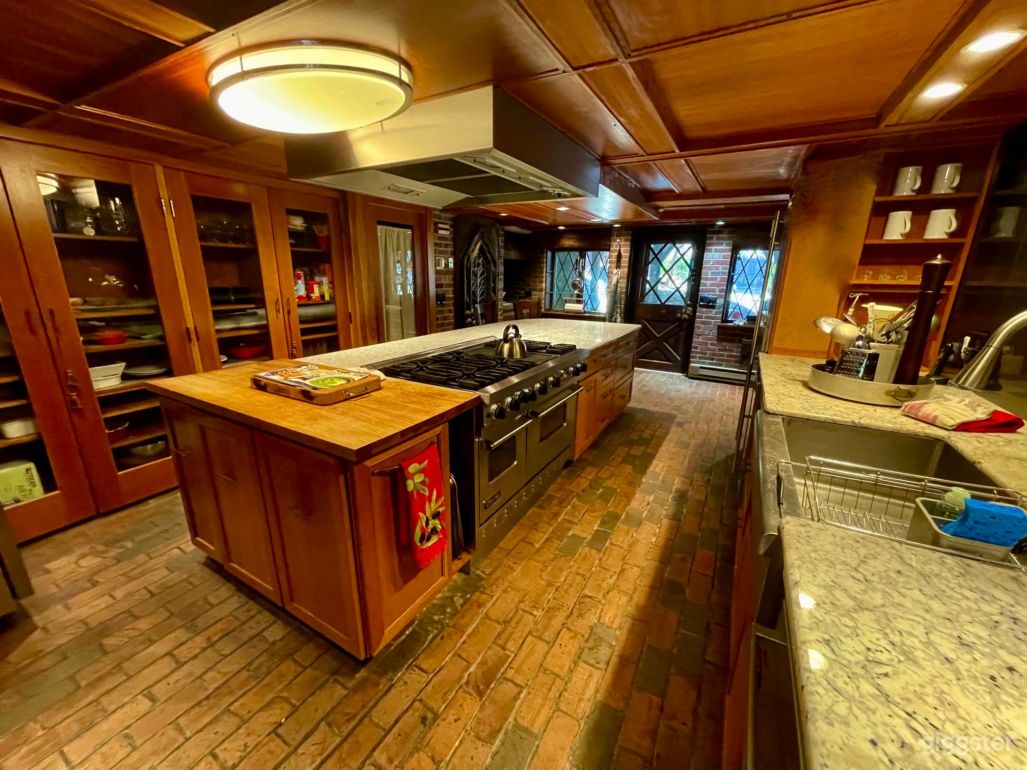 Chef's kitchen, with viking gas stove/oven, subzero fridge, stand alone freezer, farmers sink, under counter beverage center. Granite counter tops and custom cabinetry throughout.