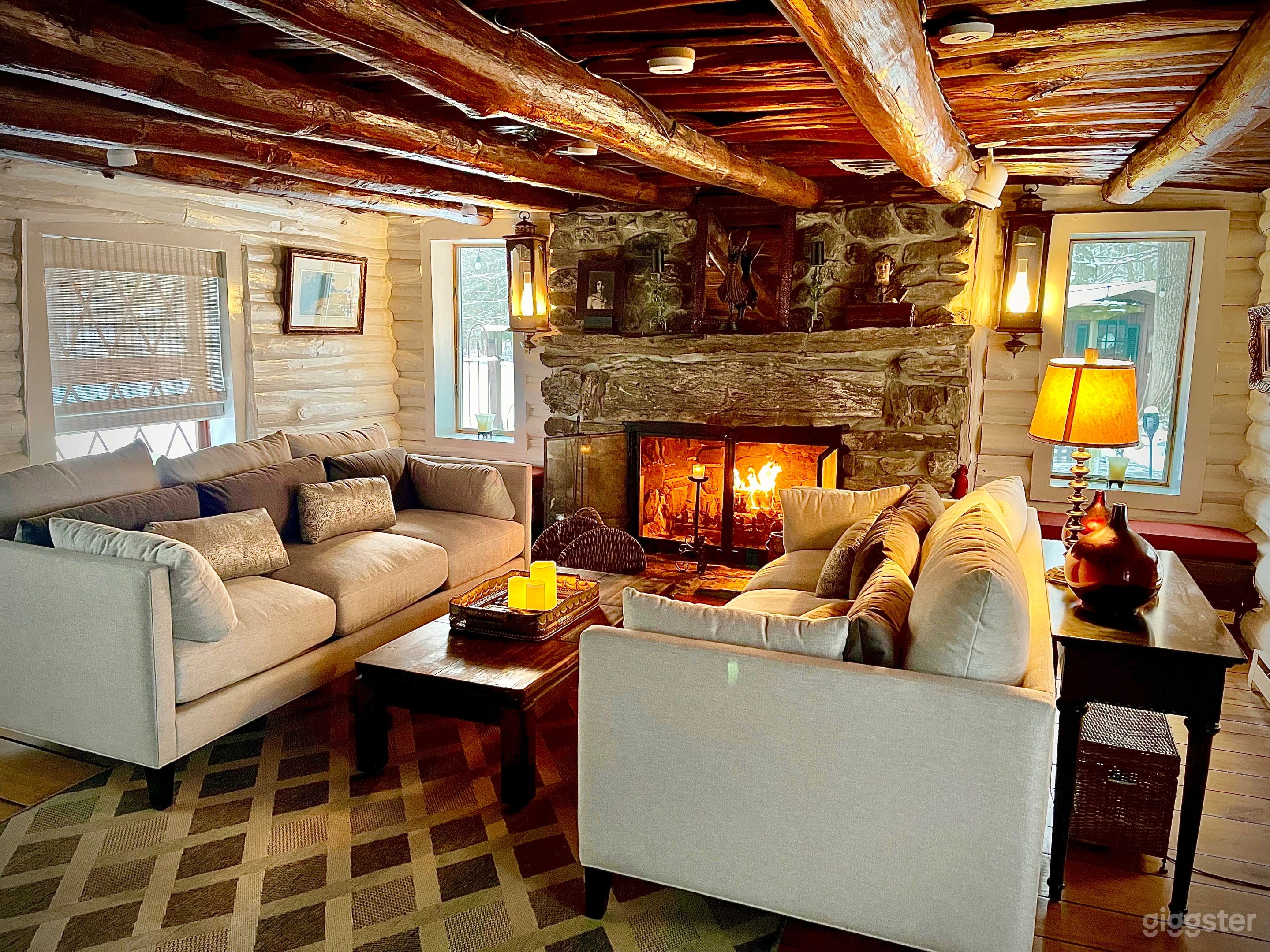 Formal living room with wood burning stone fireplace