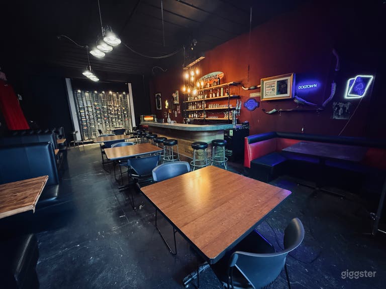 Dark Retro Dive Bar With Booths and Liquor Wall 