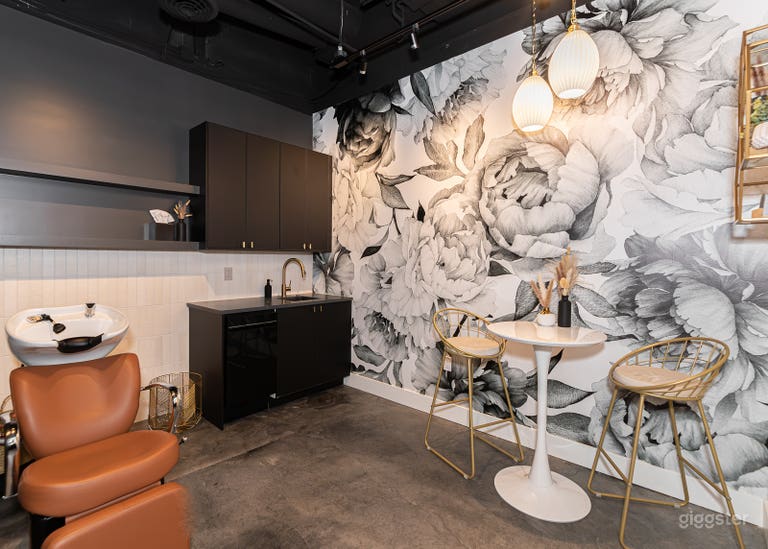  Second lounge area near the kitchenette, shampoo bowl, mini fridge and coffee bar. 