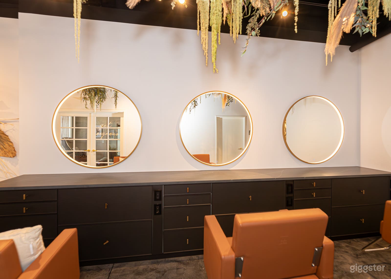 Large styling area with three comfortable chairs, massive LED-mirrors and a ton of counter space.
