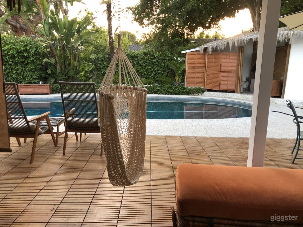 Relaxing outdoor living with pool and gardens Photo 4