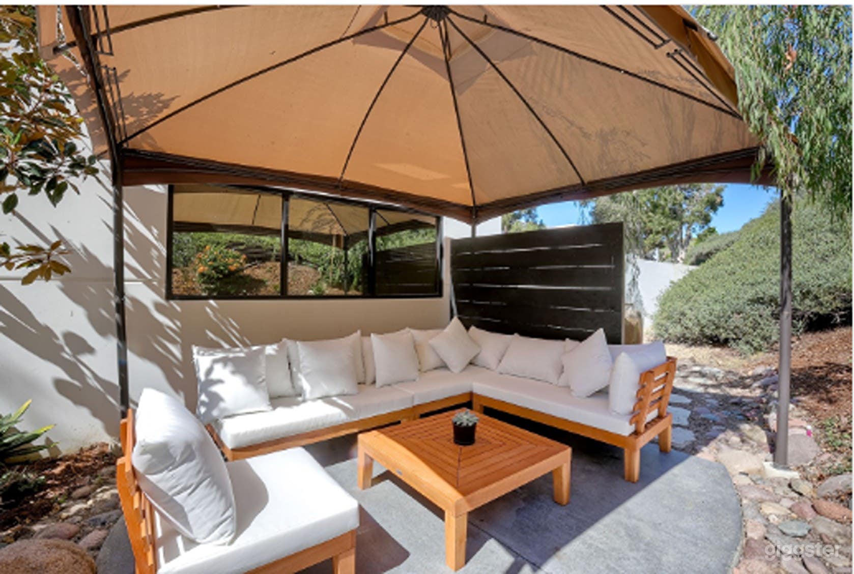 Tranquil Outdoor Garden Patio with Lounge &amp; Pergola Photo 4