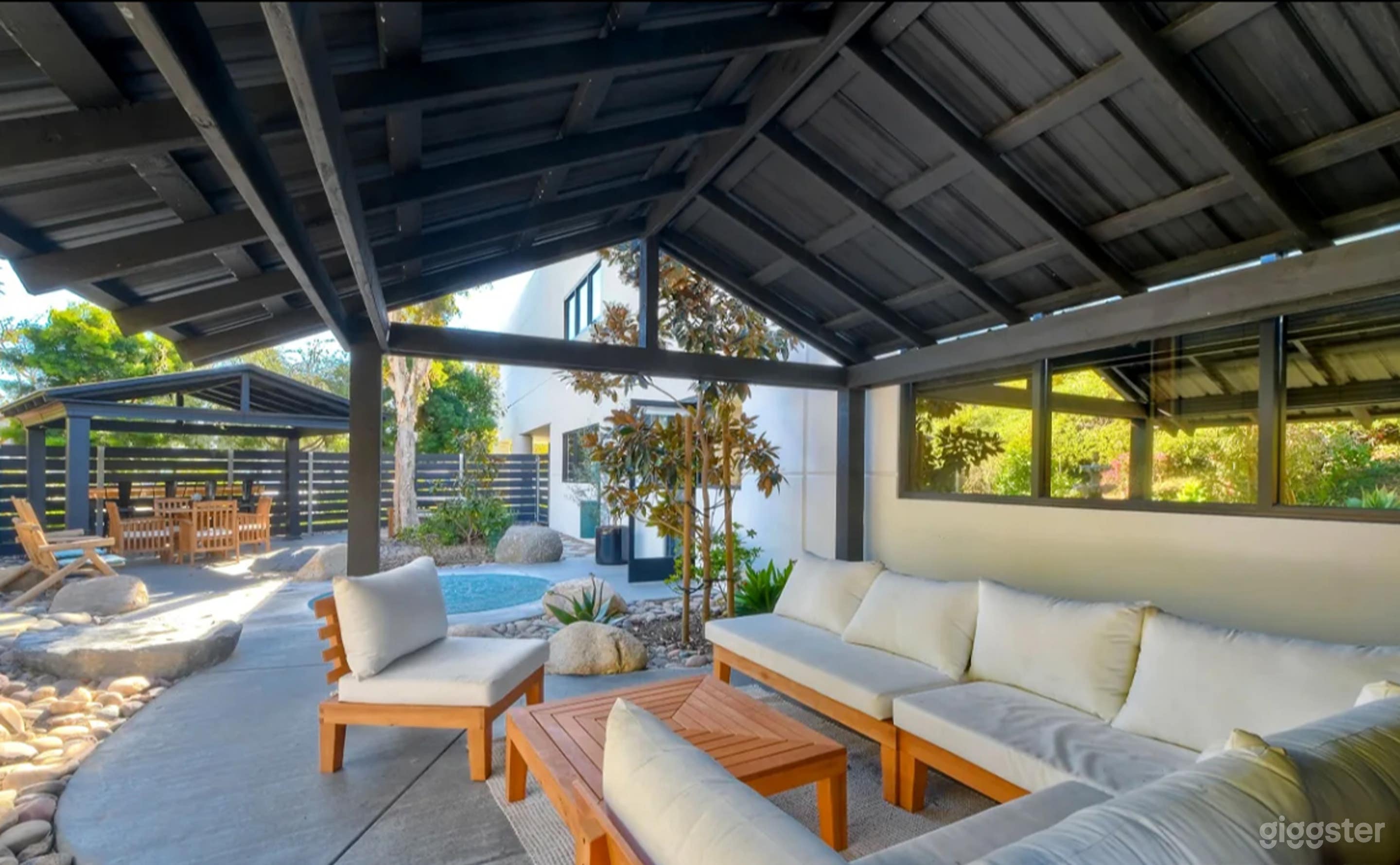 Tranquil Outdoor Garden Patio with Lounge &amp; Pergola Photo 1
