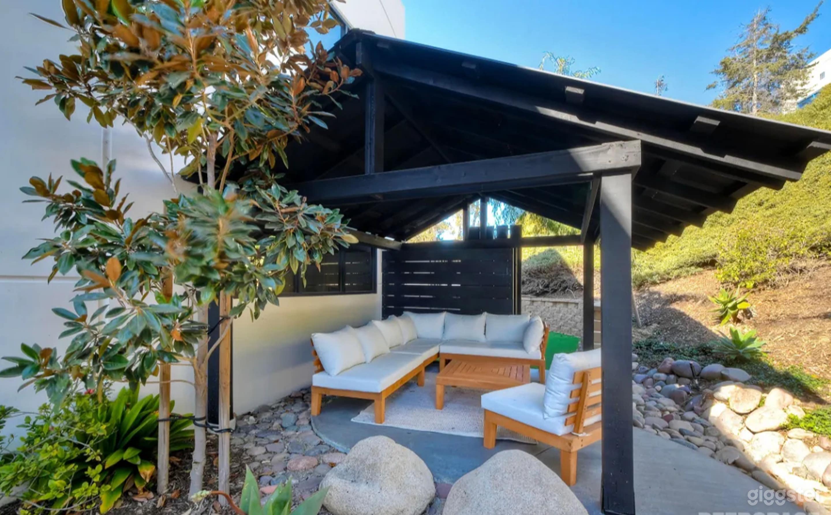 Tranquil Outdoor Garden Patio with Lounge &amp; Pergola Photo 2