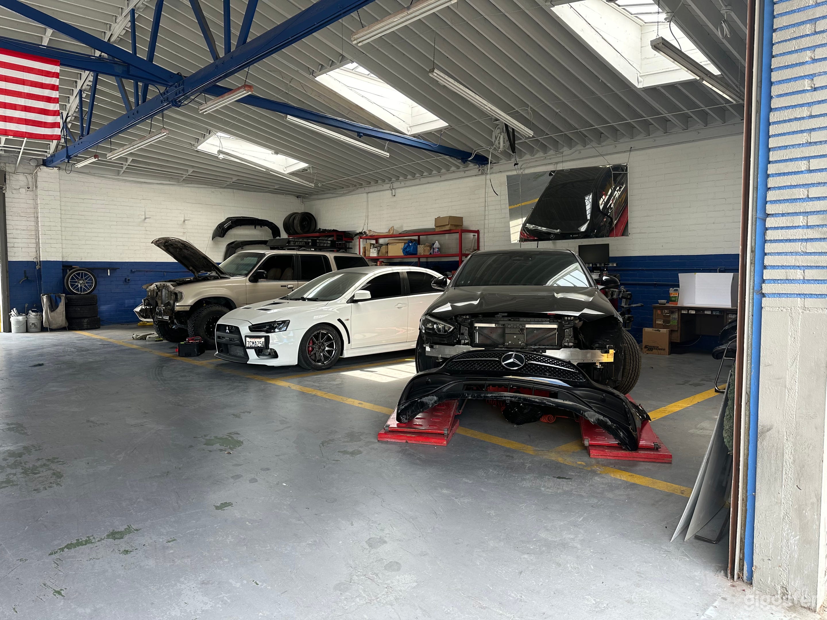 One-of-a-Kind Car Showroom & Body Shop Photo 2