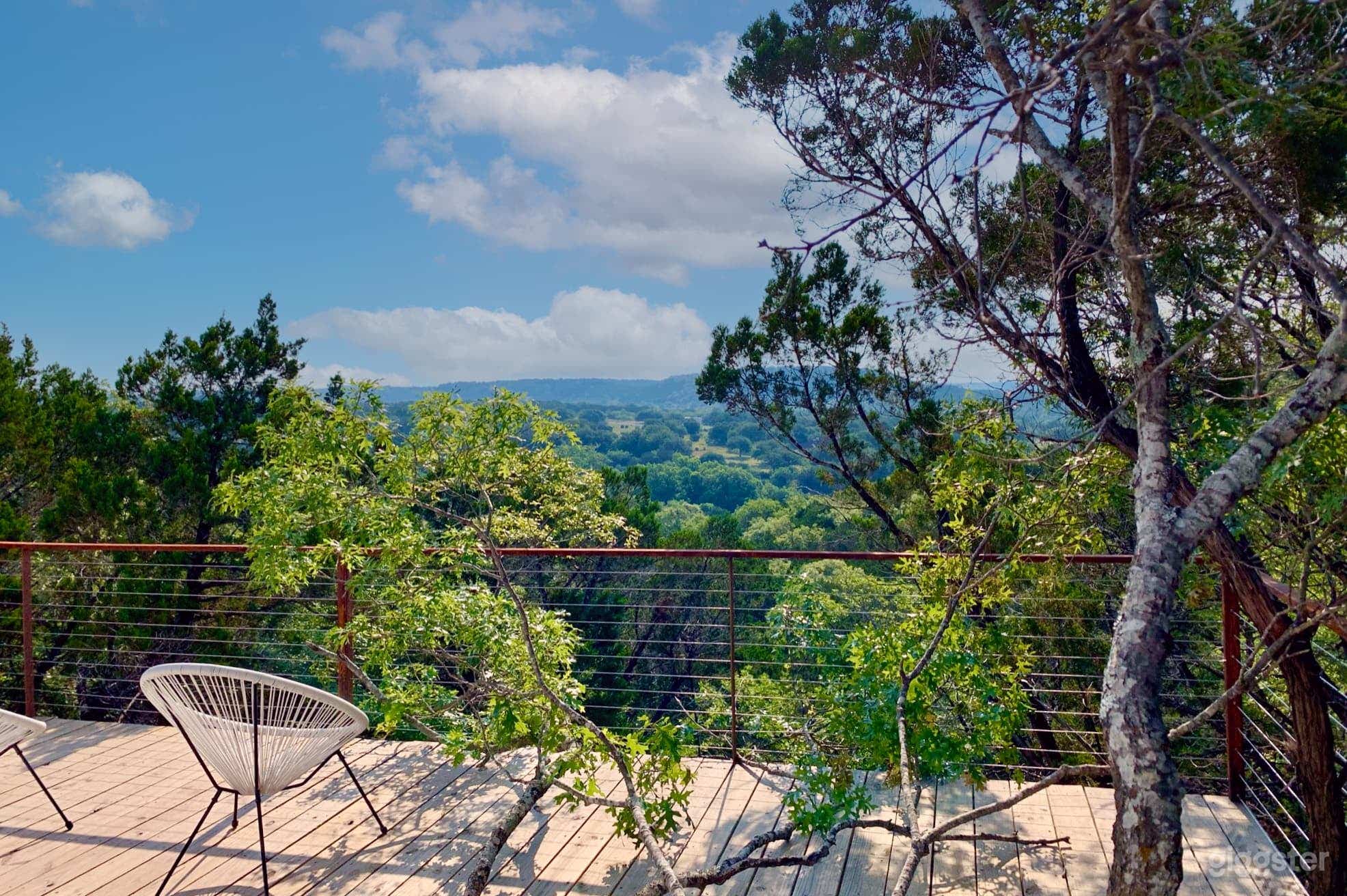 Immerse yourself in the grandeur of nature as you gaze upon this vast and inviting landscape