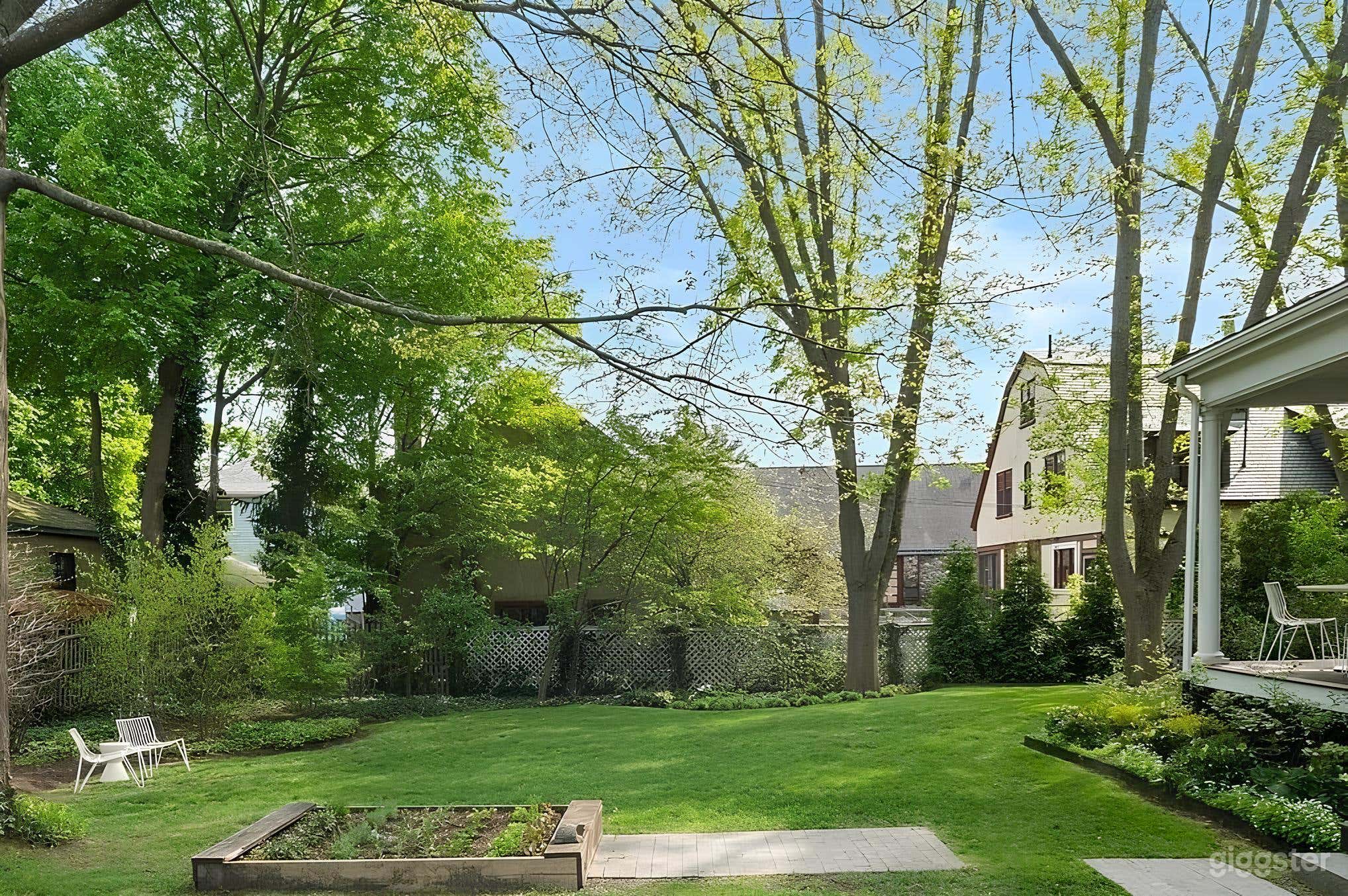 Well-Kept Grassy Backyard Photo 1