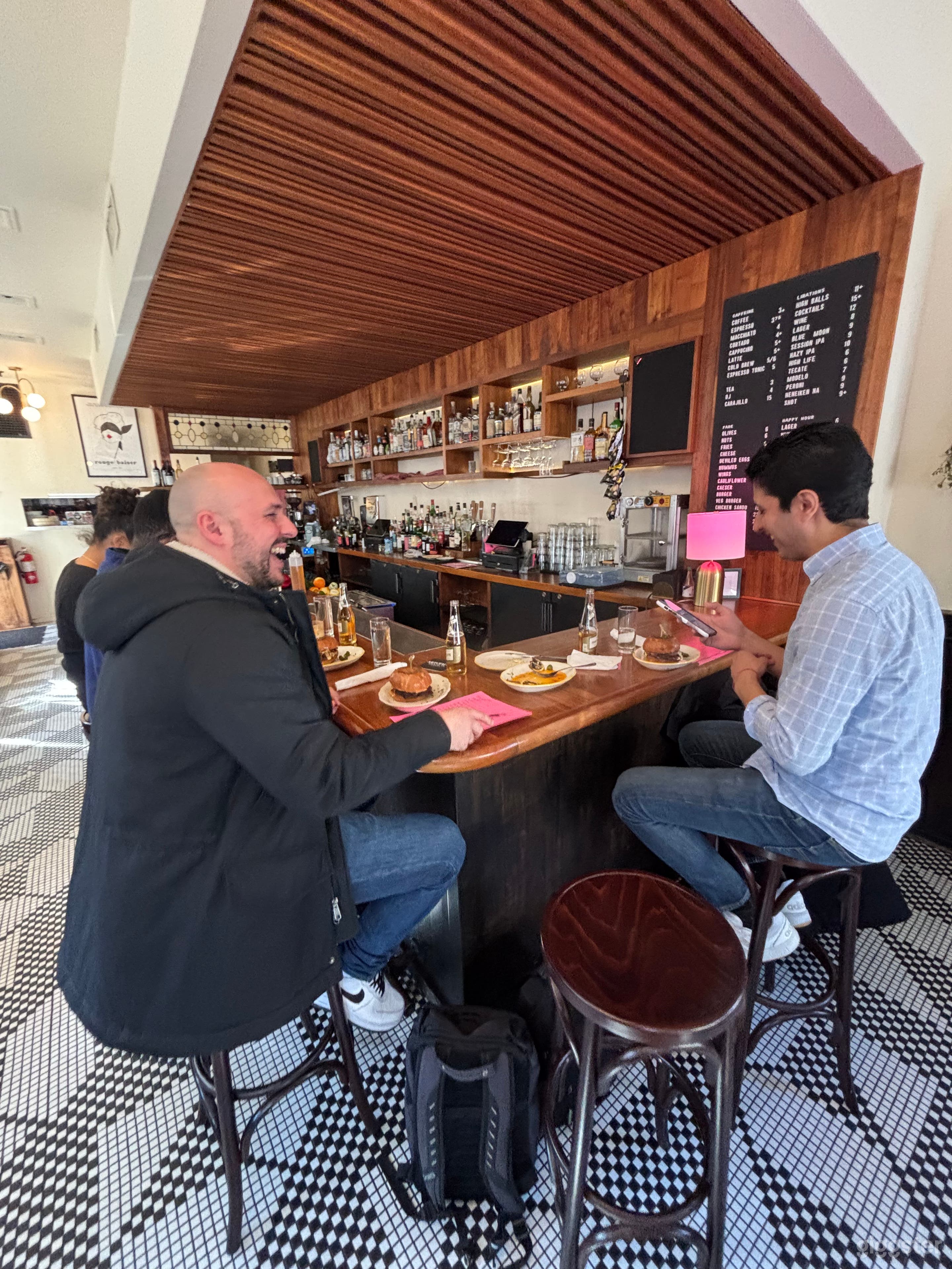 Chic French-inspired cocktail bar with moody vibes Photo 1