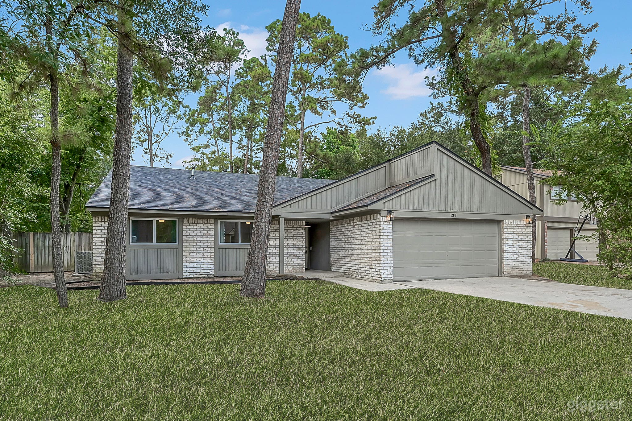 Modern Suburban Home in The Woodlands, TX Photo 1