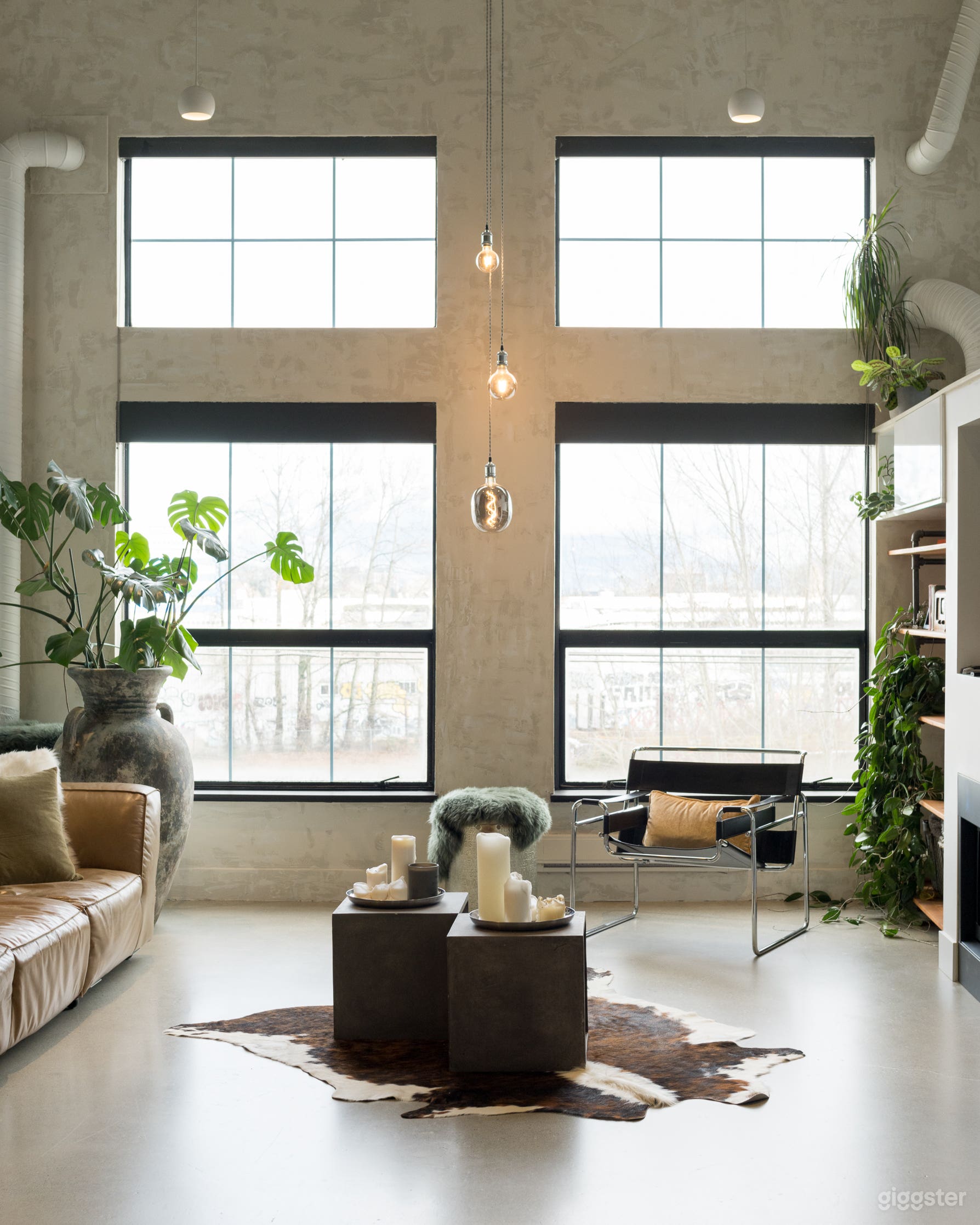 Industrial Loft Featuring a Hand-Painted Backdrop Photo 2