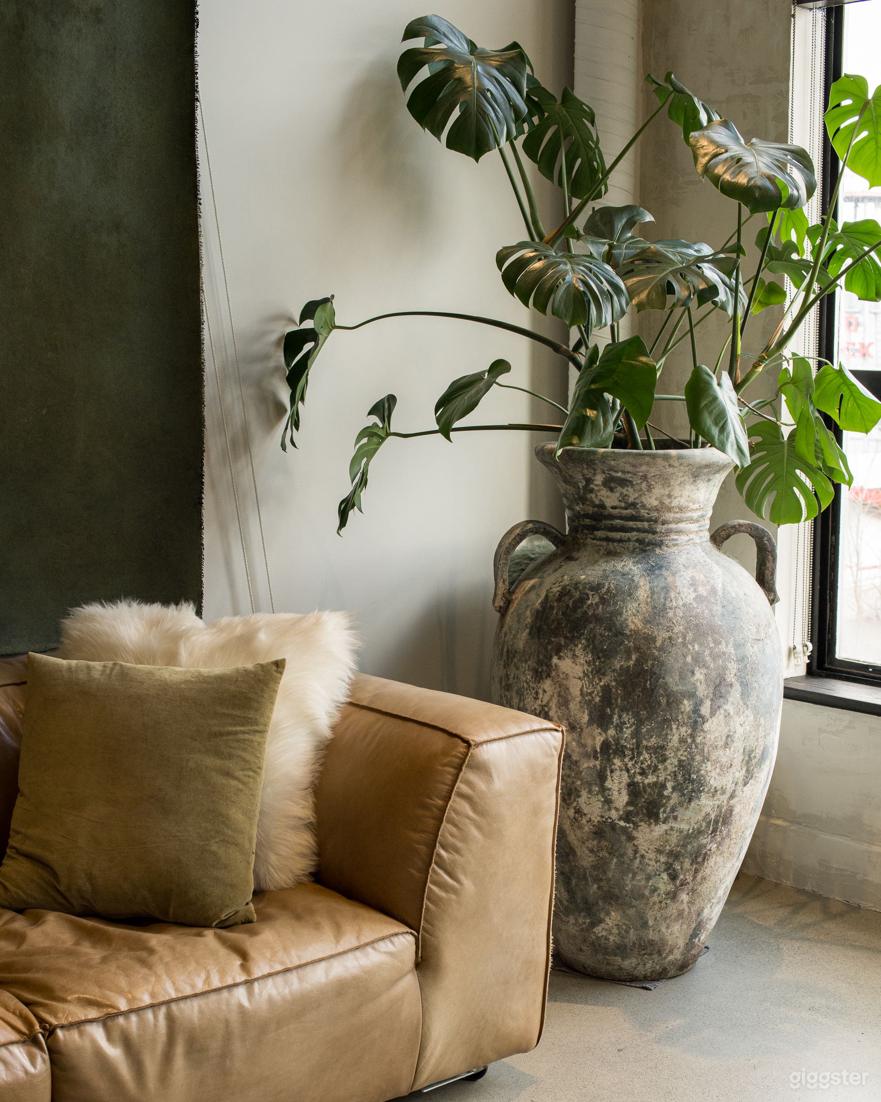 Industrial Loft Featuring a Hand-Painted Backdrop Photo 4