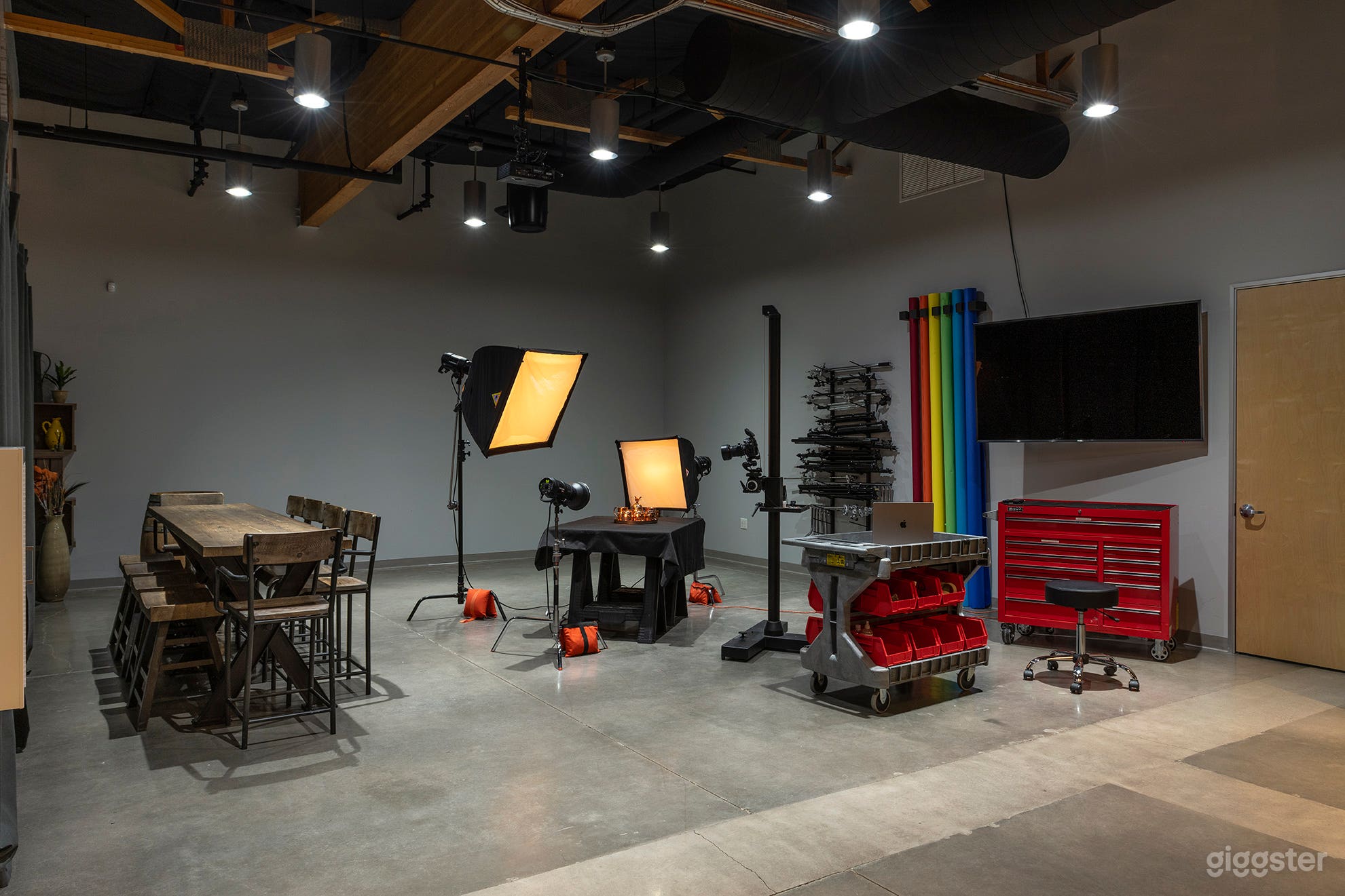 Ideal photography studio equipped props and tools to excel your creativity. Manfrotto Salon 7' camera stand and additional C-stands, Profoto monolights with transmitter, various light stands and backgrounds available.