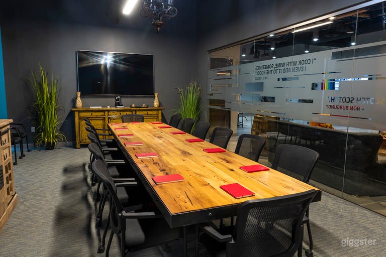  Conference room with a custom built wood table sitting 14. Additional chairs available. A 70&quot;Smart T.V. and AppleTV. Wi-Fi available.  