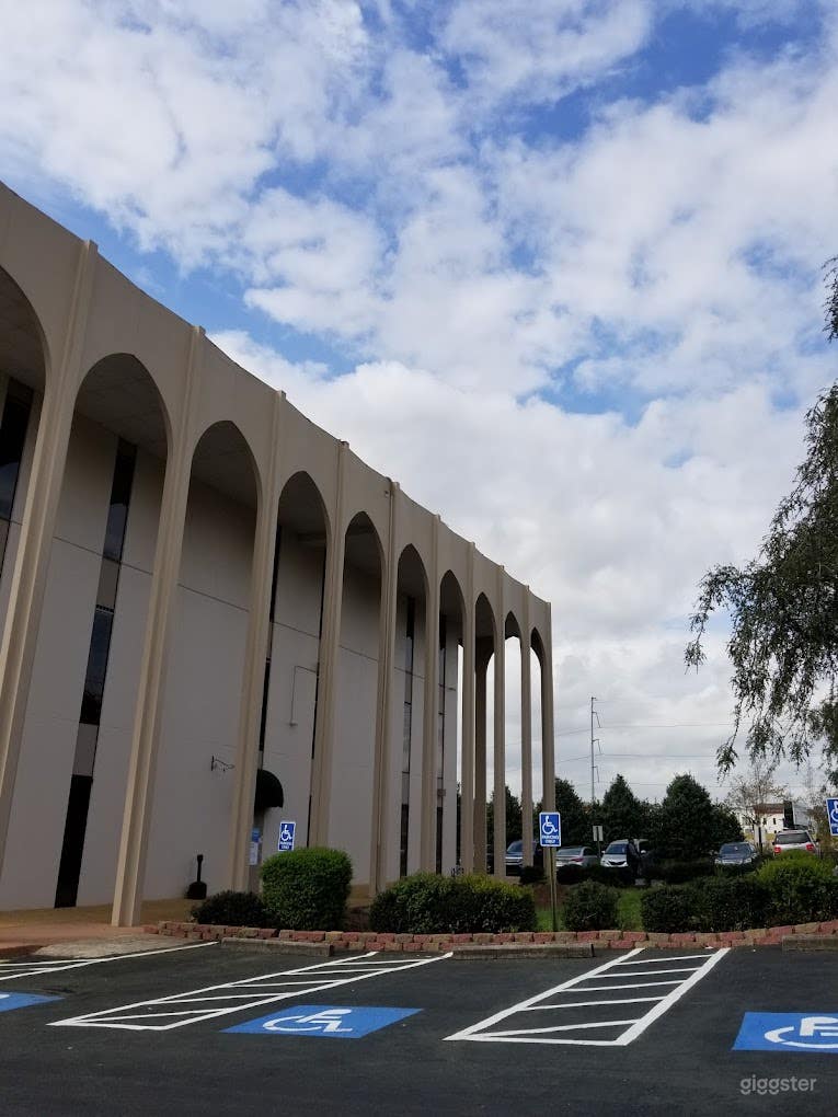 The actual building with front and back parking